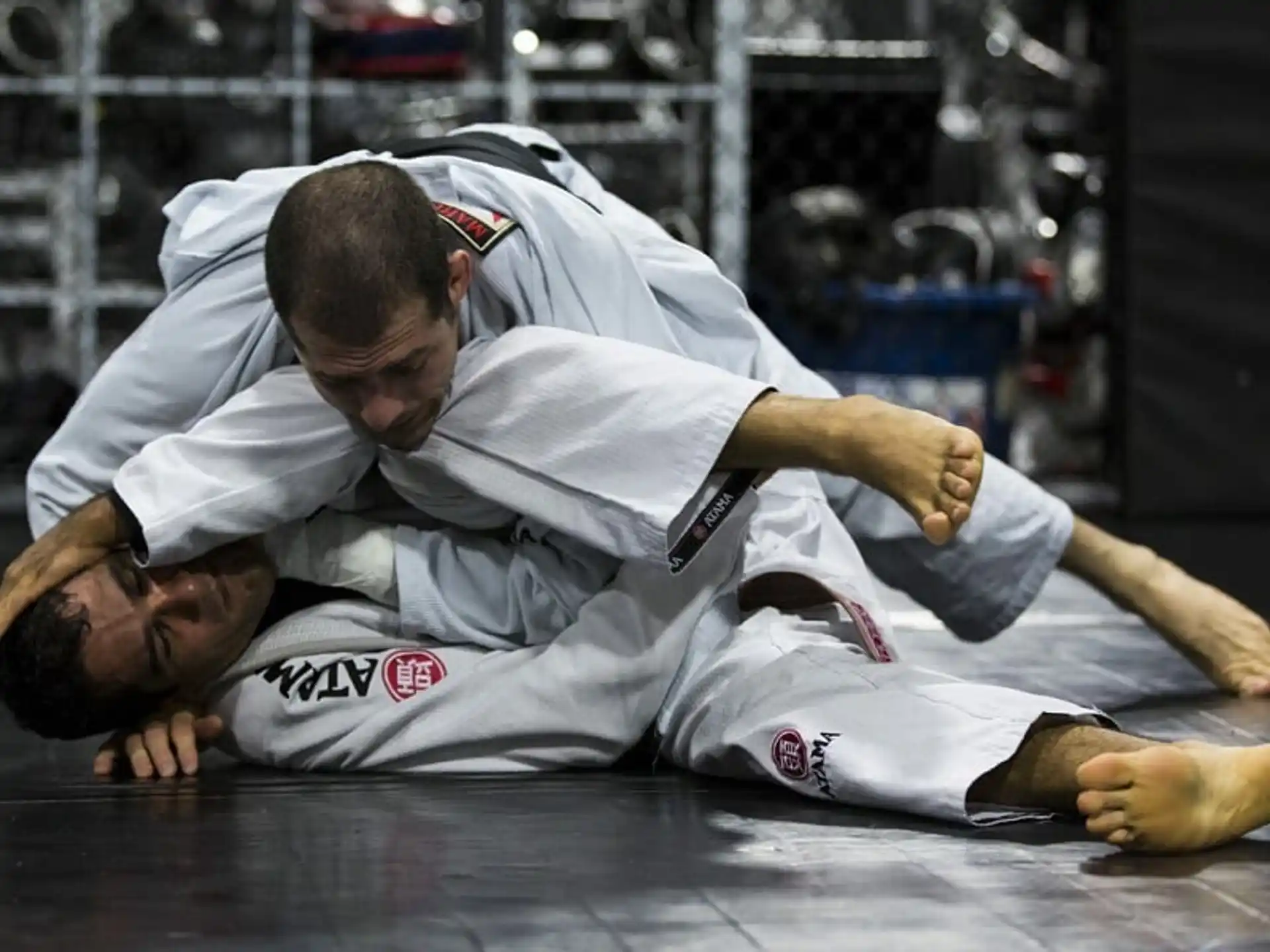 a couple of men wrestling