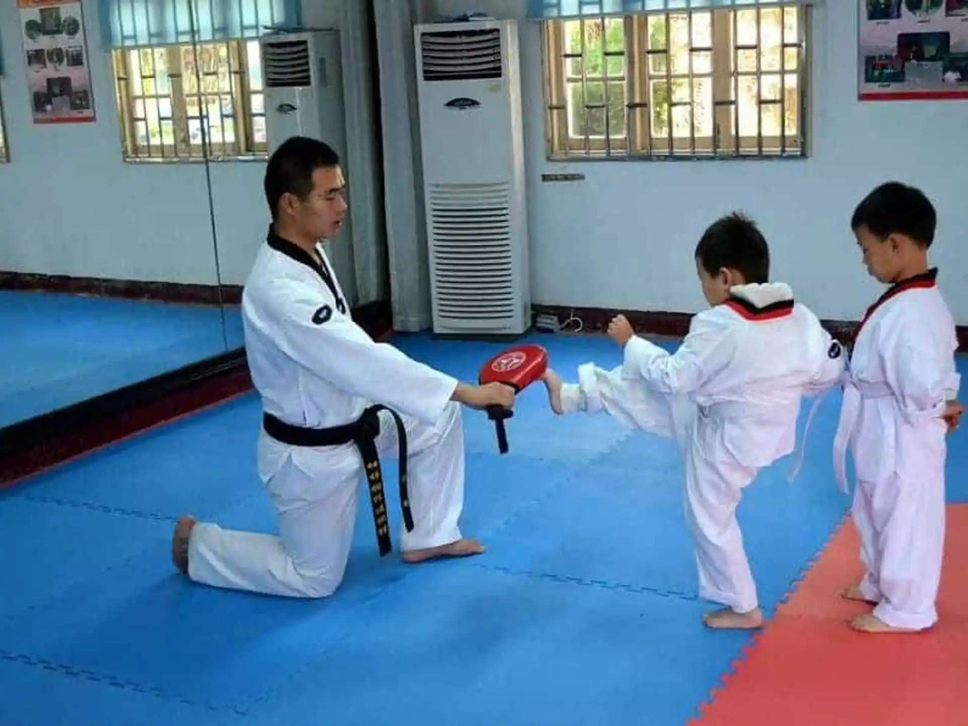 a group of kids practicing karate