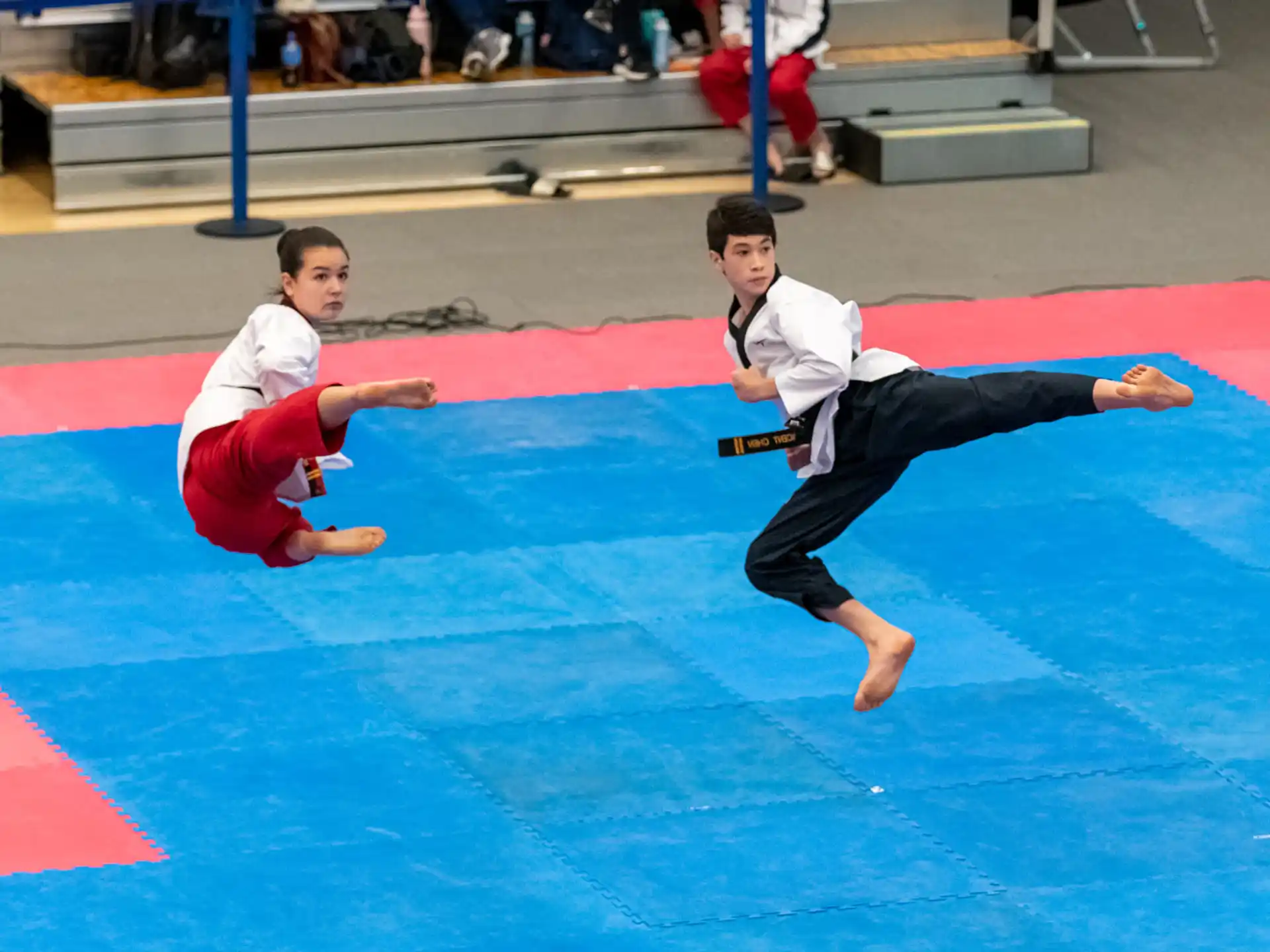 two boys in karate uniforms