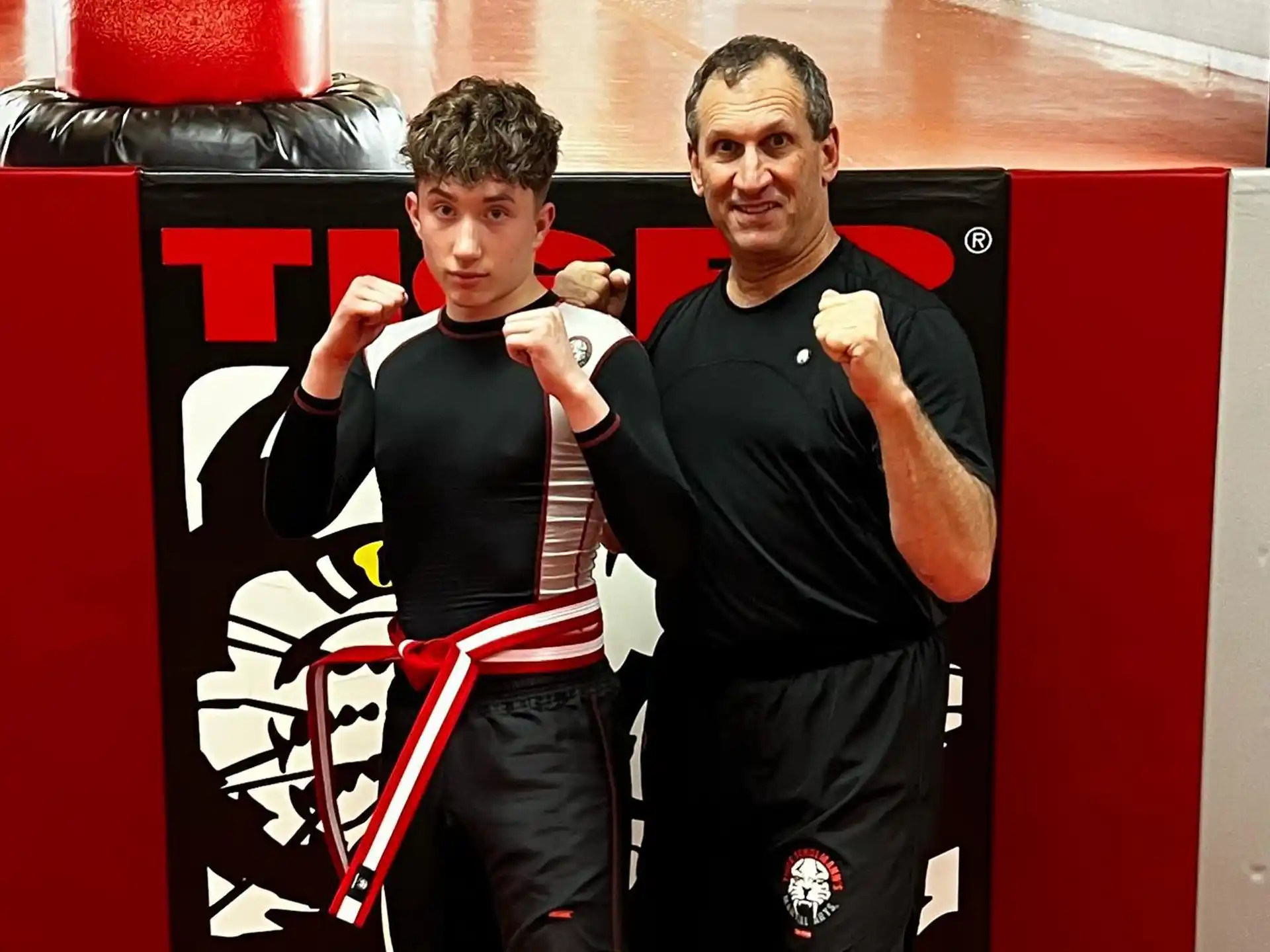 a man and a boy posing for a picture