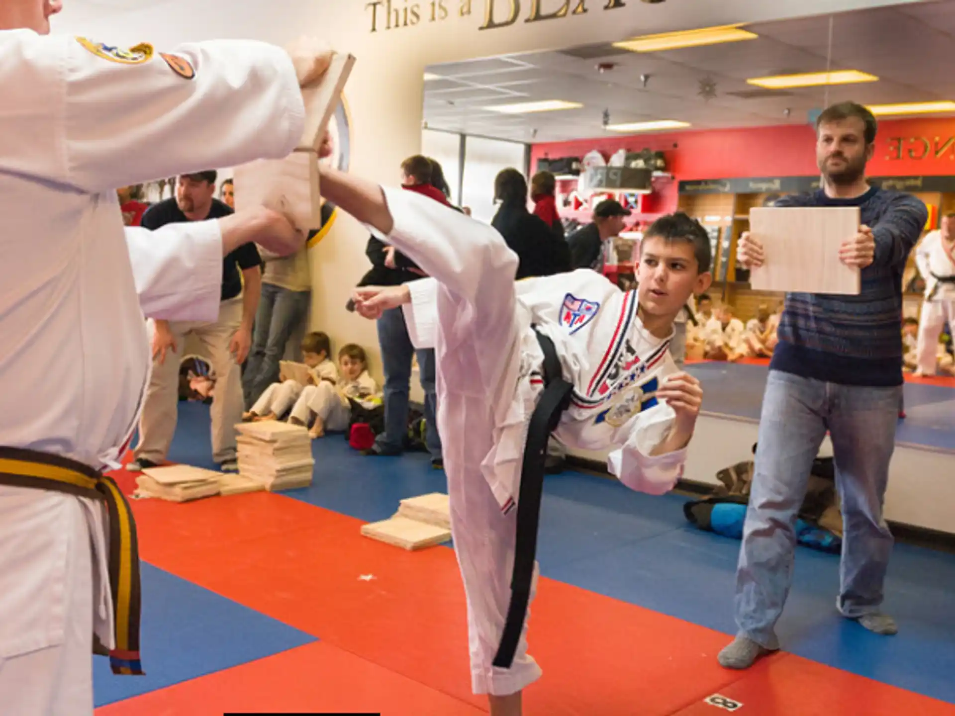 a group of people in karate uniforms