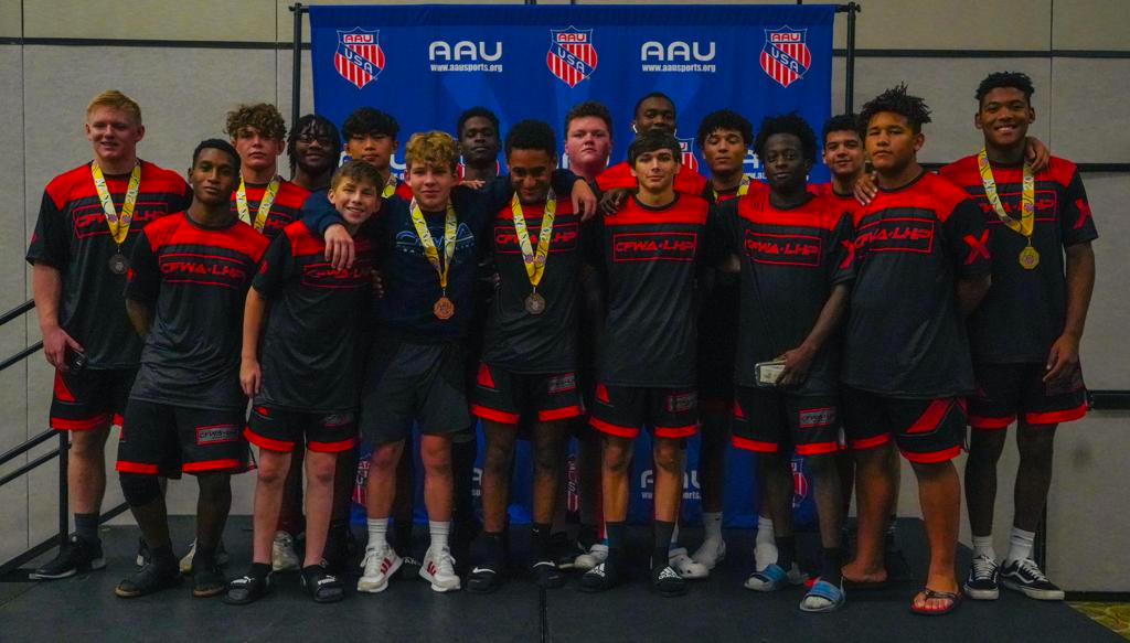 a group of athletes posing for a picture