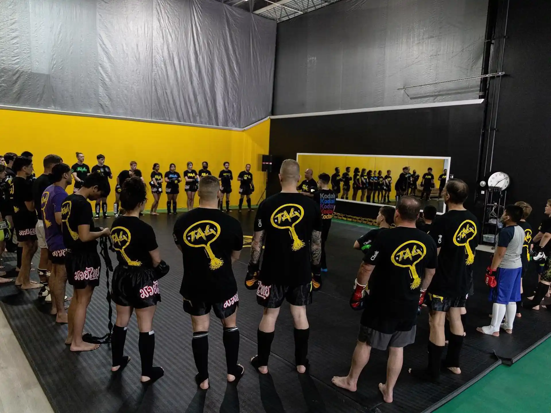 a group of people in a gym