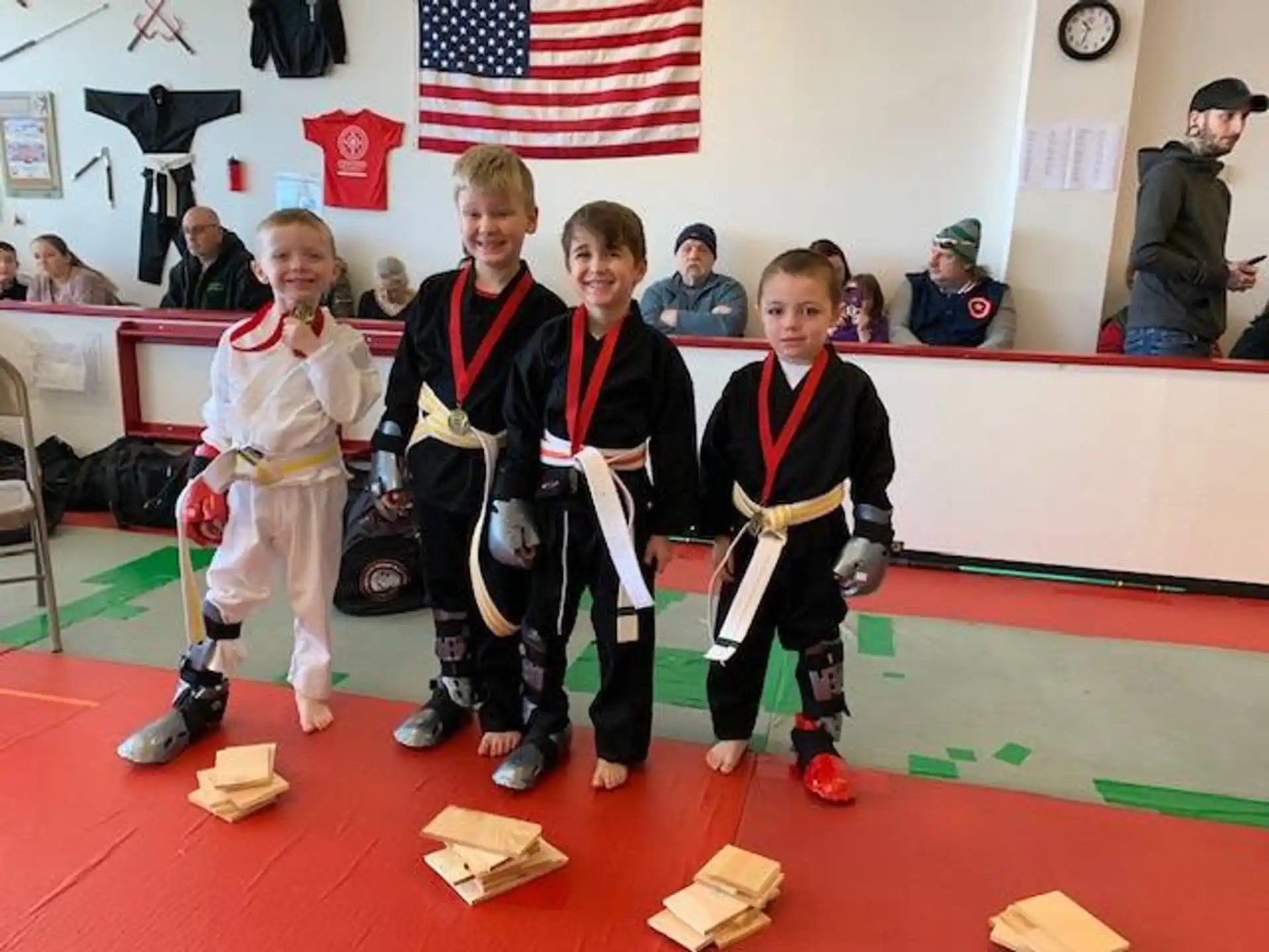 a group of children wearing medals