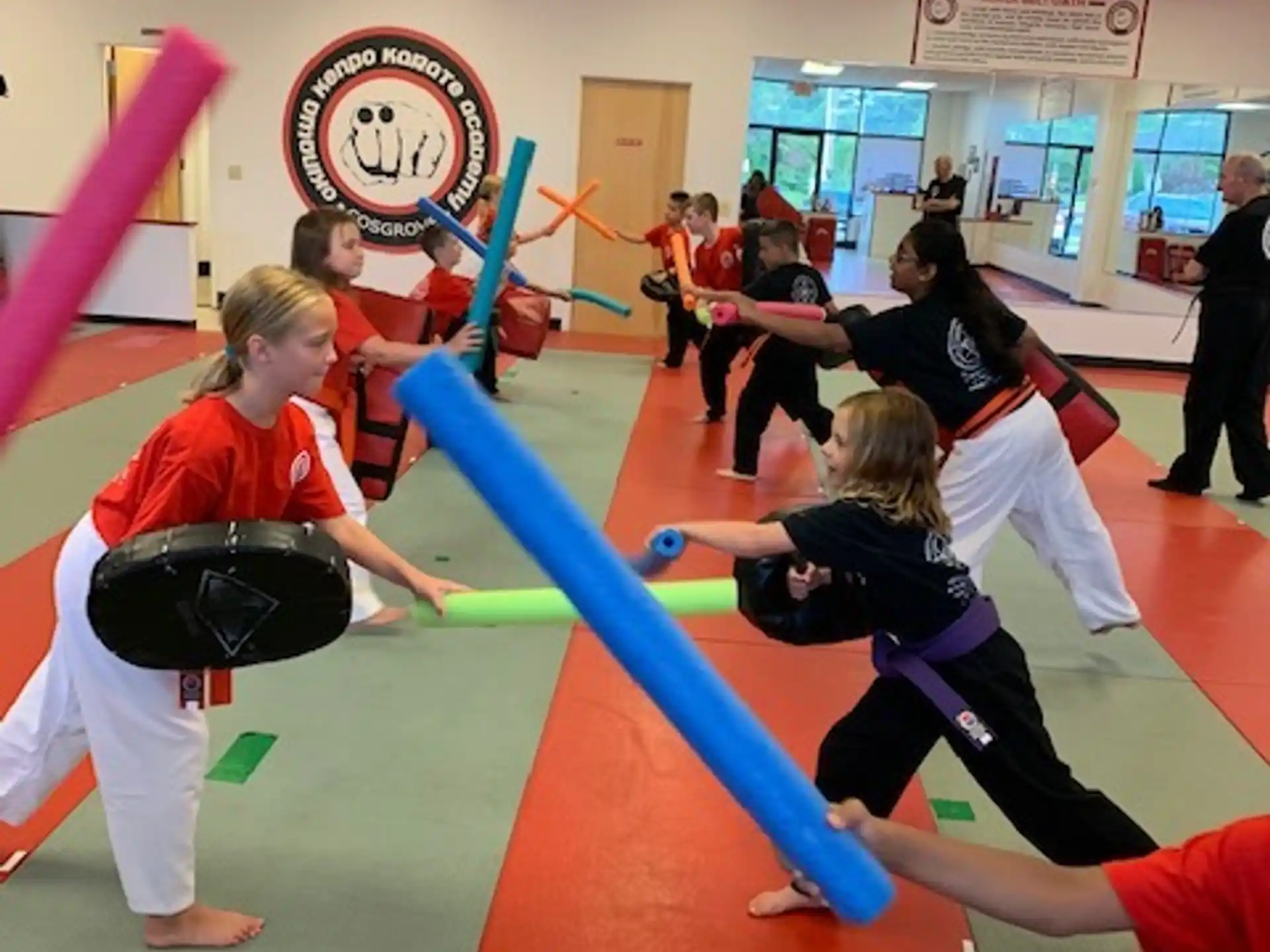 a group of people in a gym