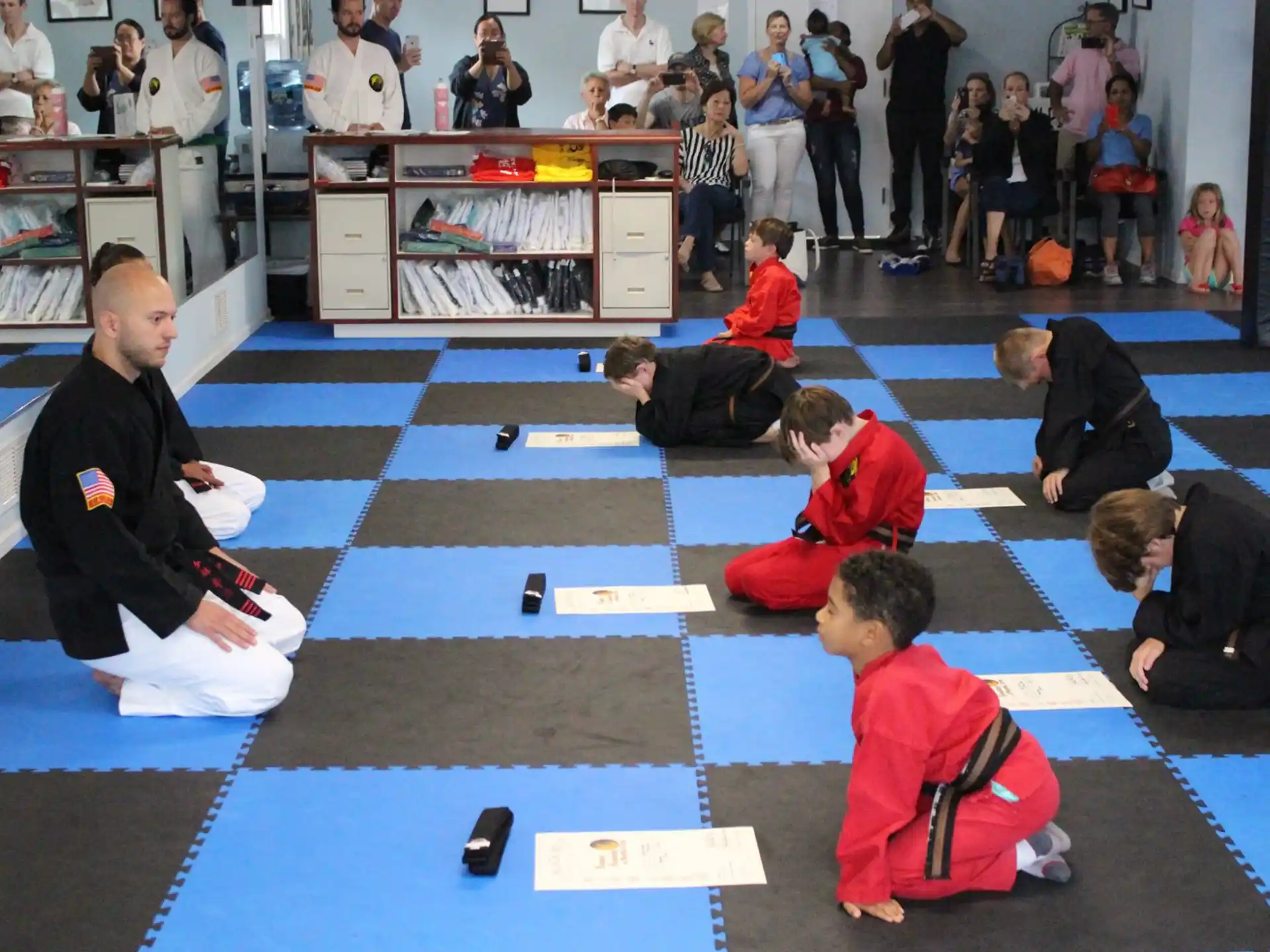 a group of people sitting on the floor