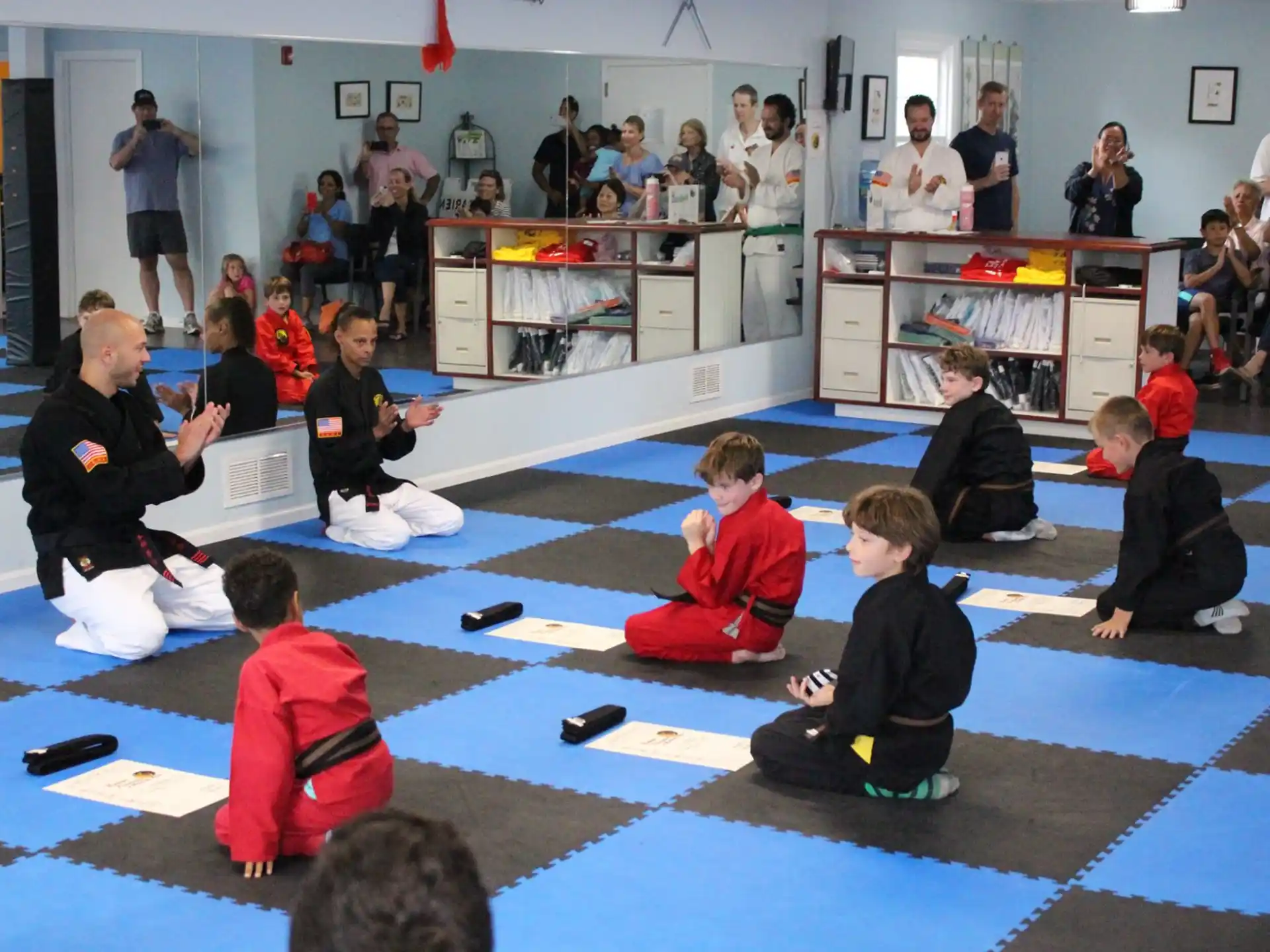 a group of people sitting on the floor