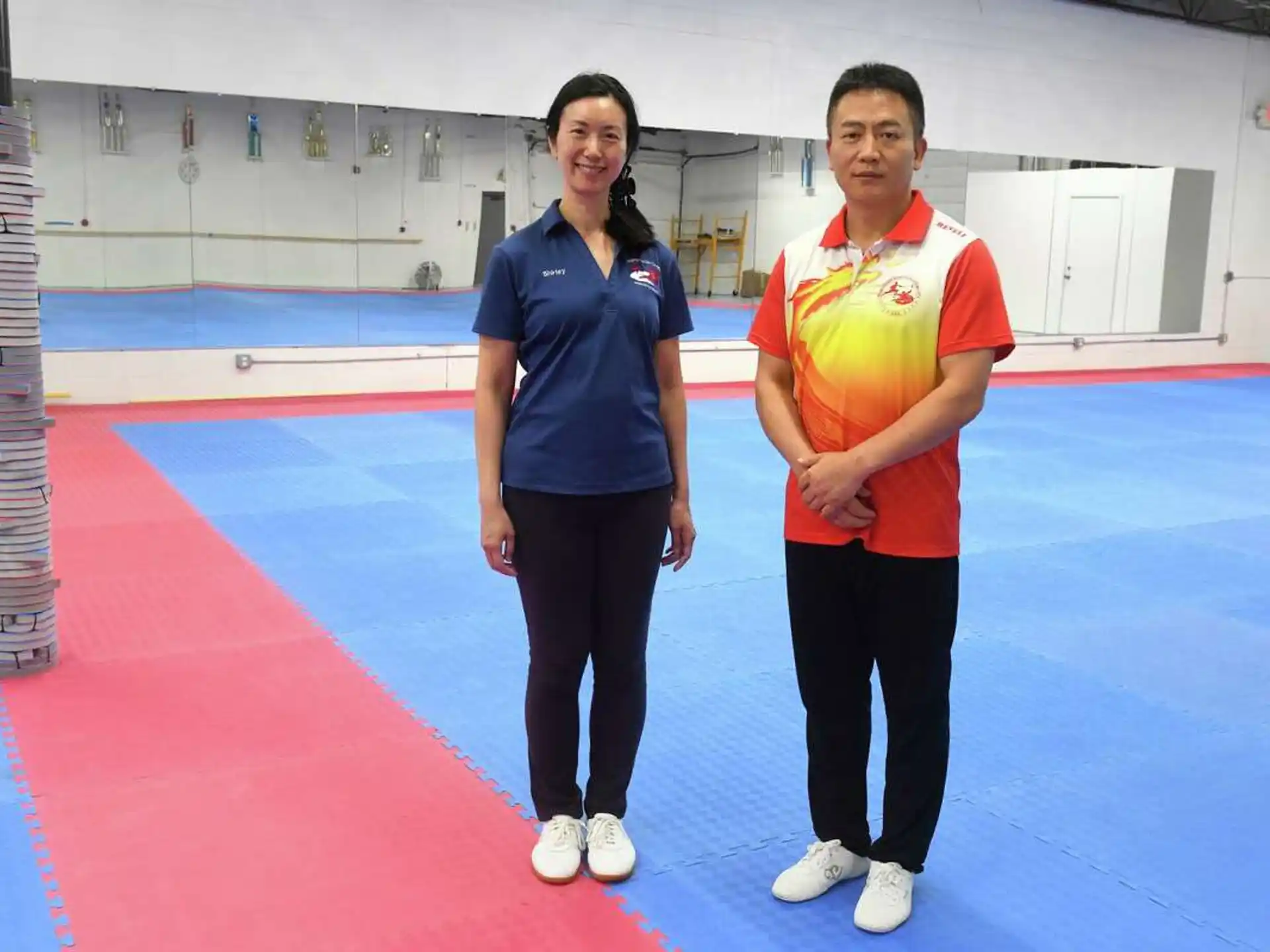 a man and woman posing for a picture
