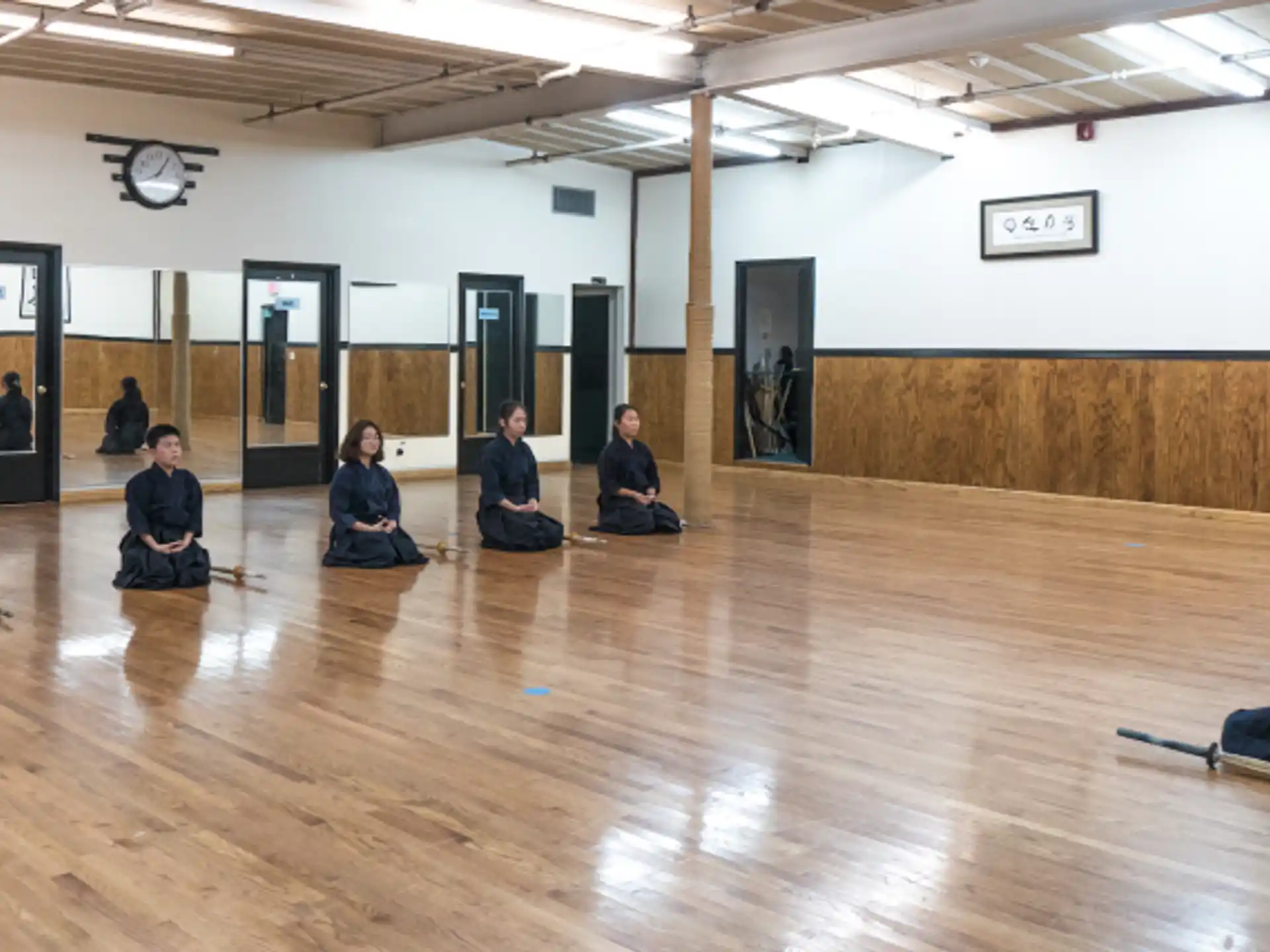 a group of people sitting on the floor in a room