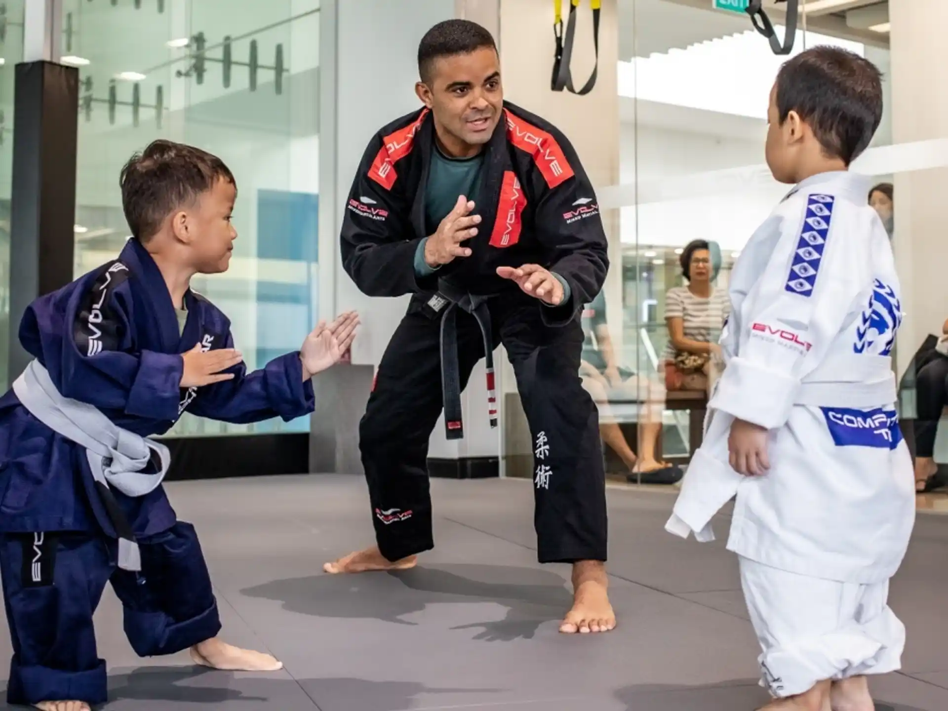 a group of people in karate uniforms