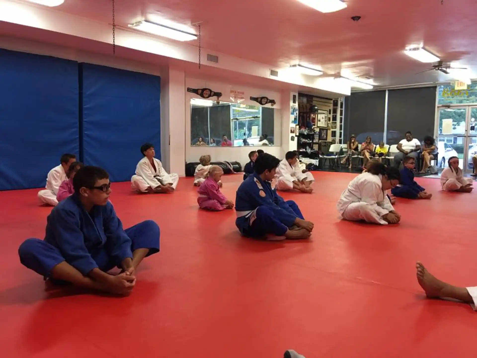 a group of people sitting on the floor