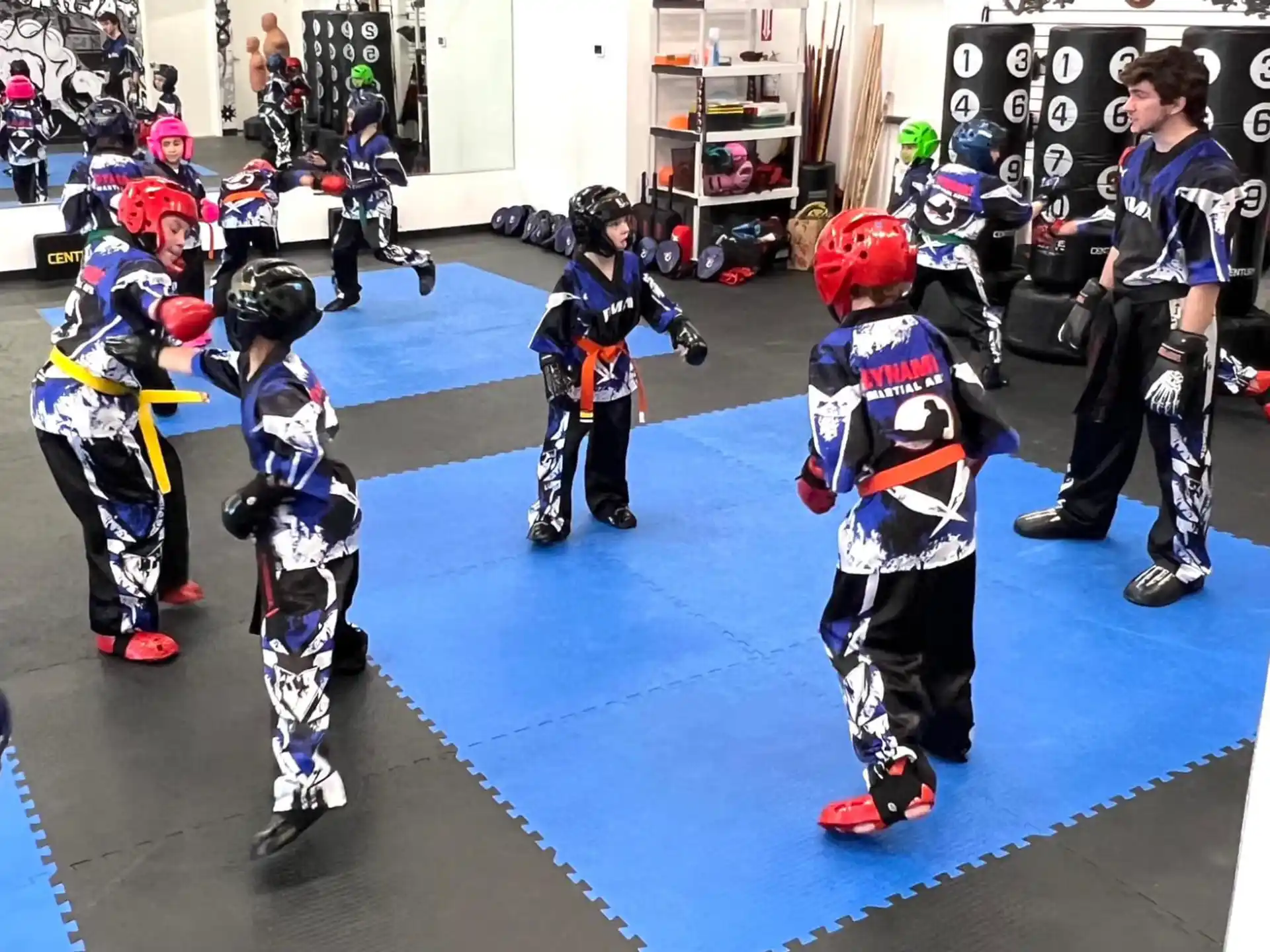 a group of kids wearing hockey uniforms