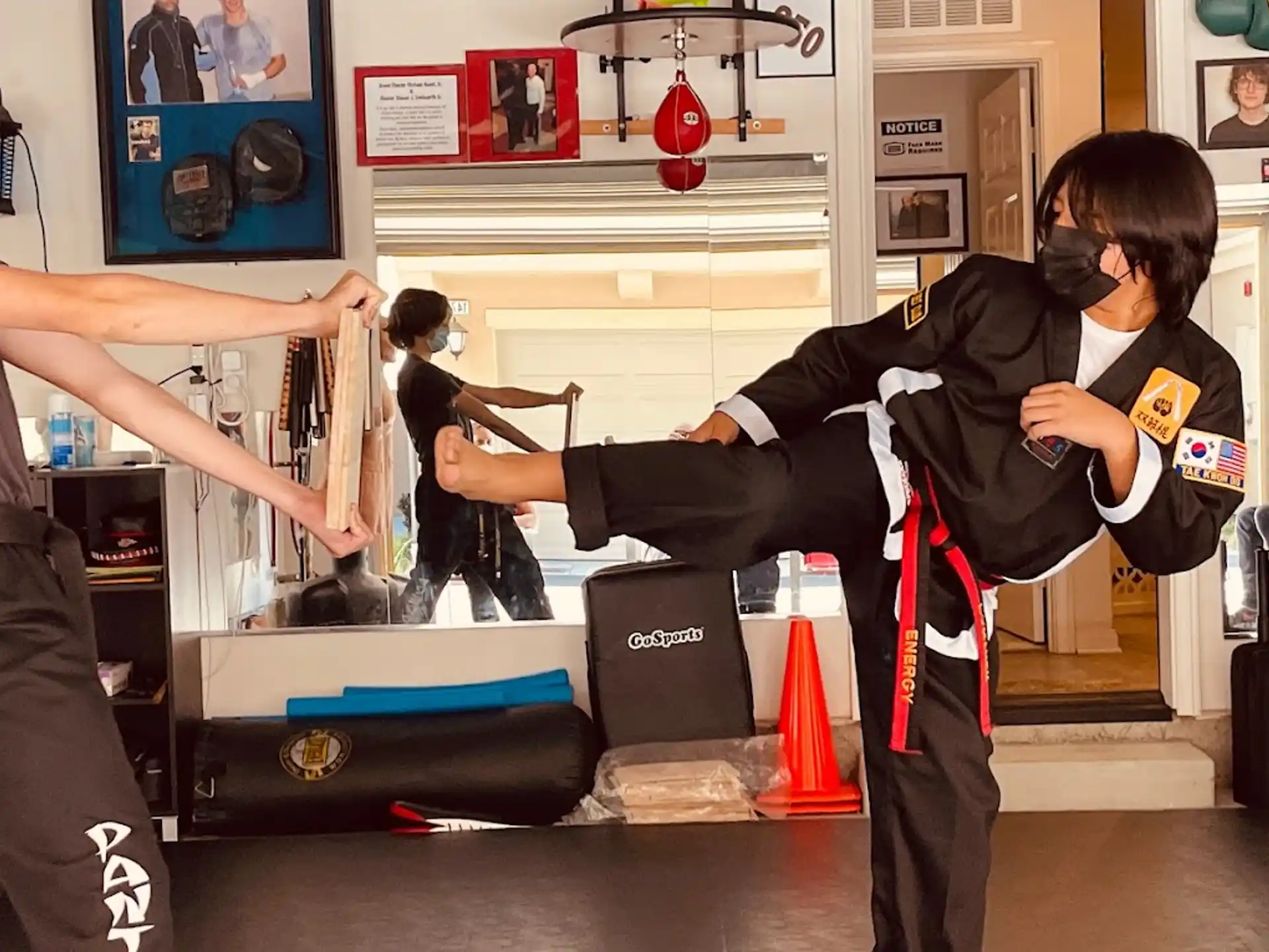 a person lifting another man