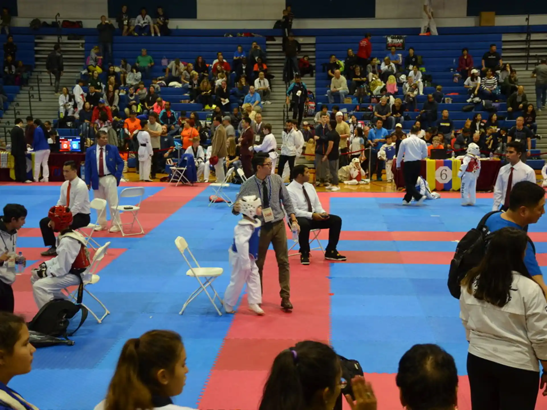 a group of people in a karate class
