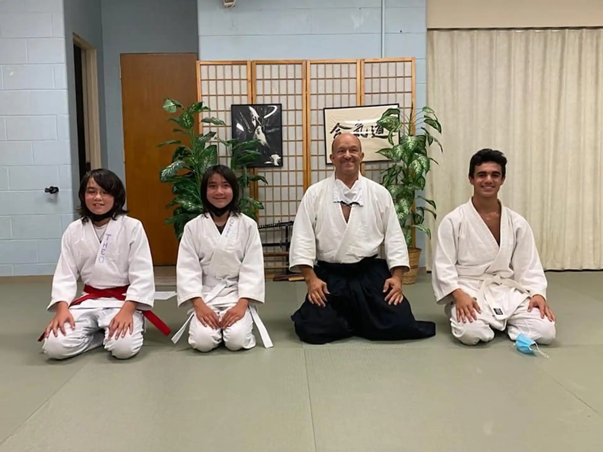 a group of people sitting on the floor