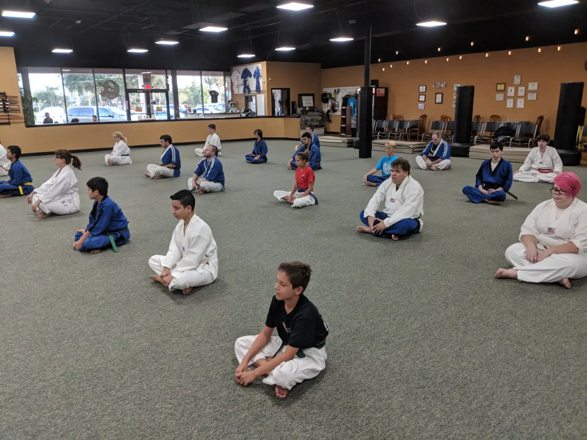 a group of people sitting on the floor