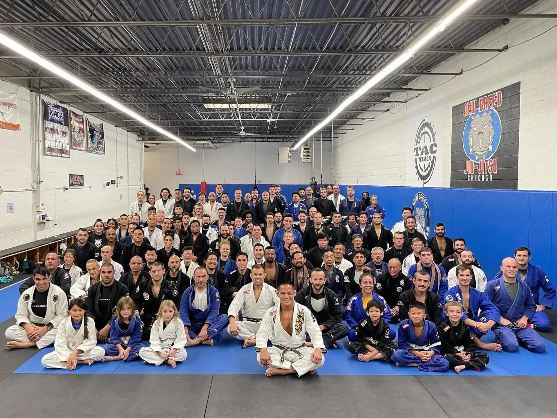 a group of people sitting on the floor