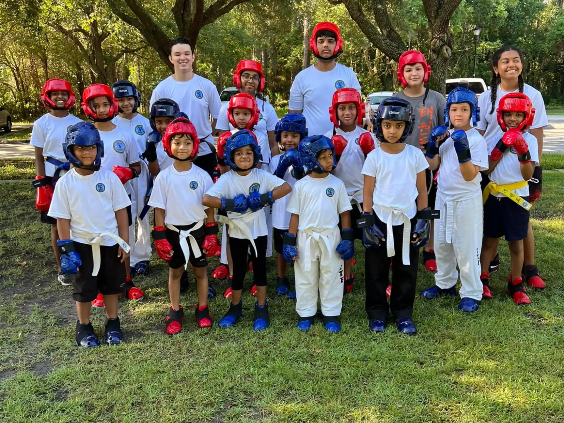 a group of kids wearing helmets
