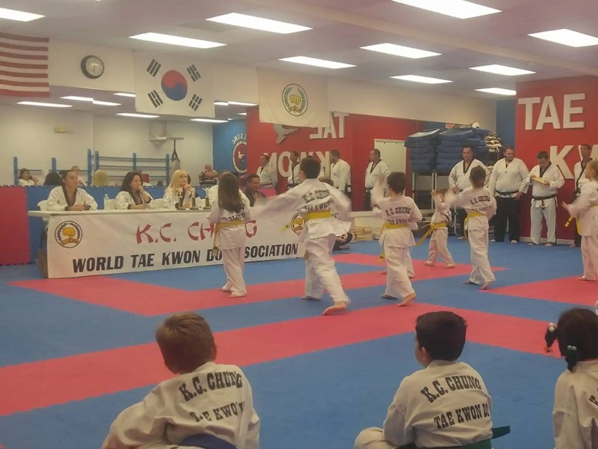 a group of people in a karate class