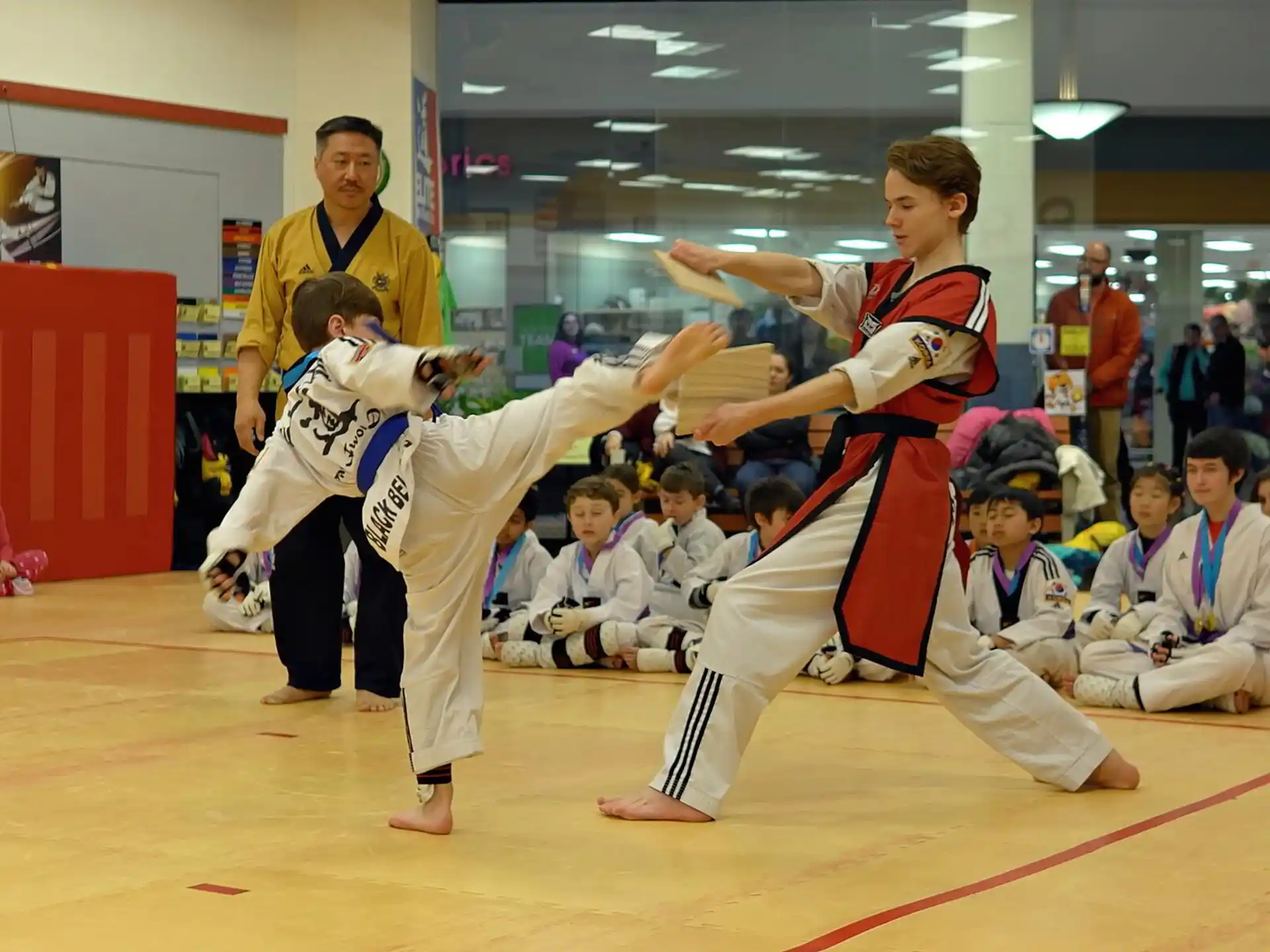 a group of people in karate uniforms