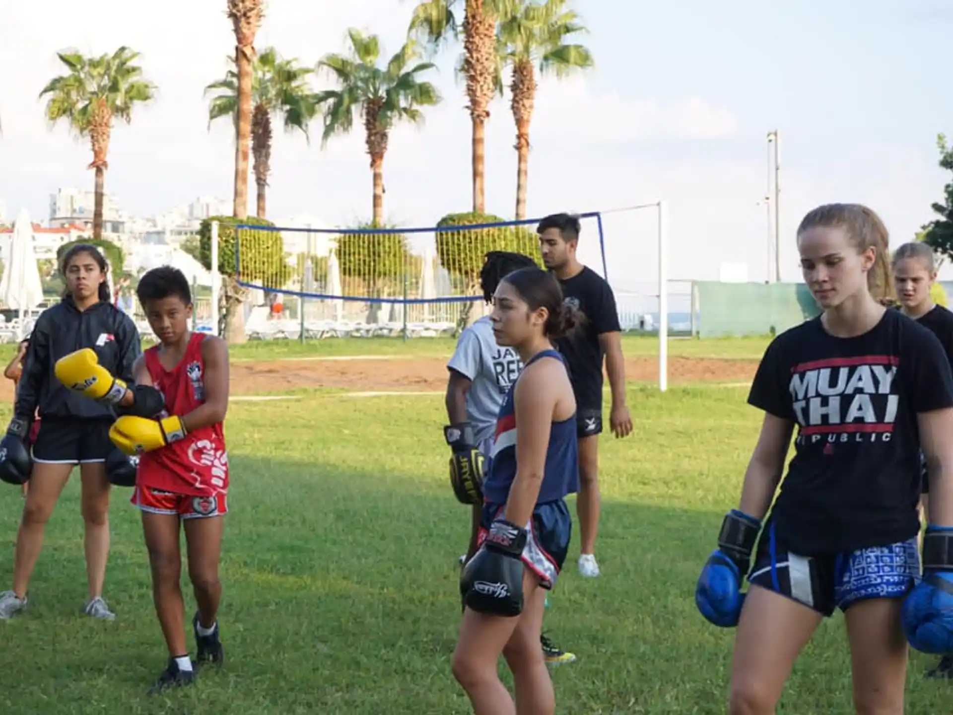 a group of kids playing football