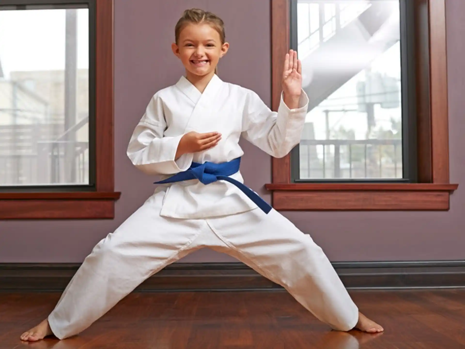a boy in a karate uniform