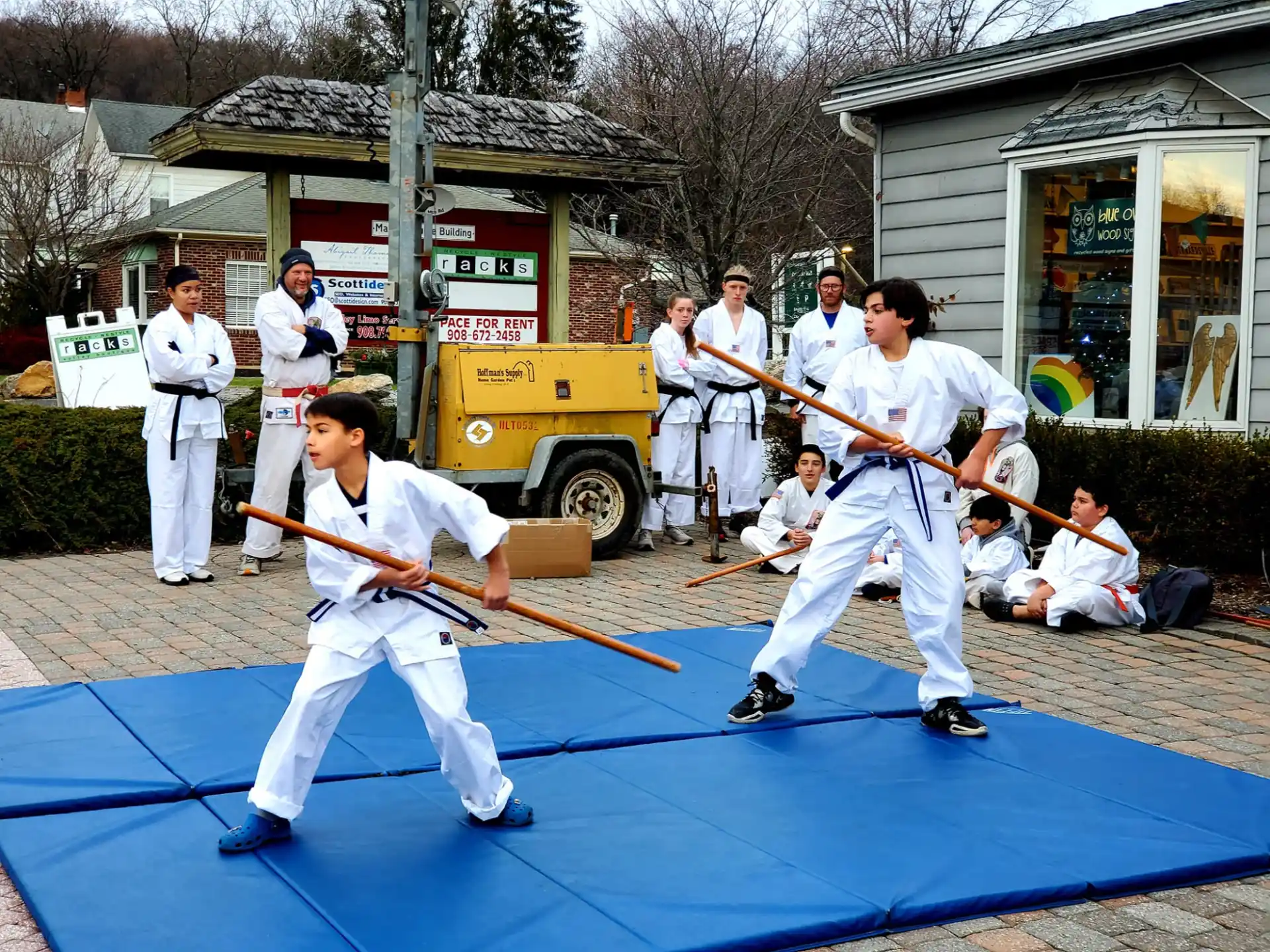 a group of people in karate uniforms