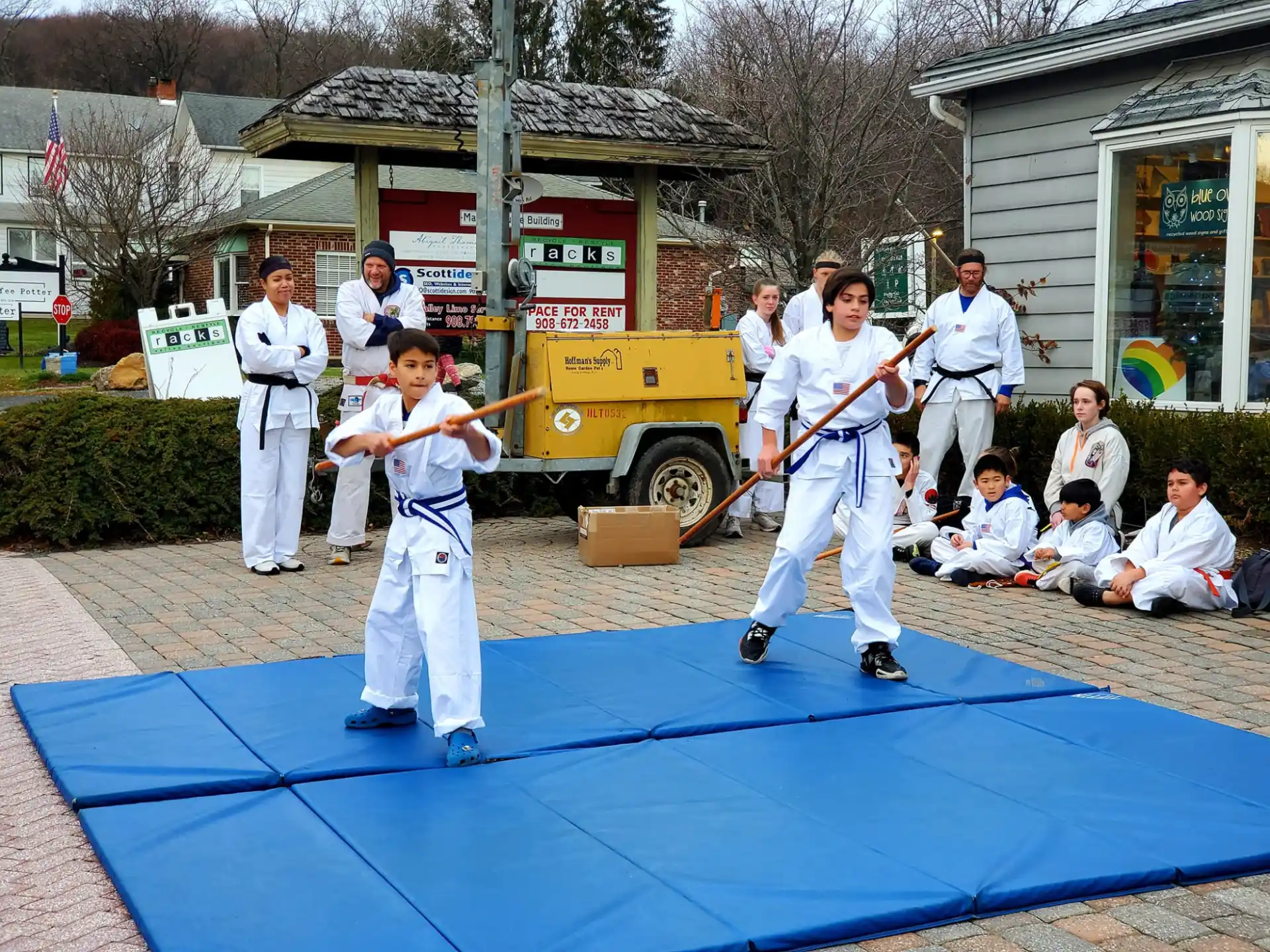 a group of people in karate uniforms