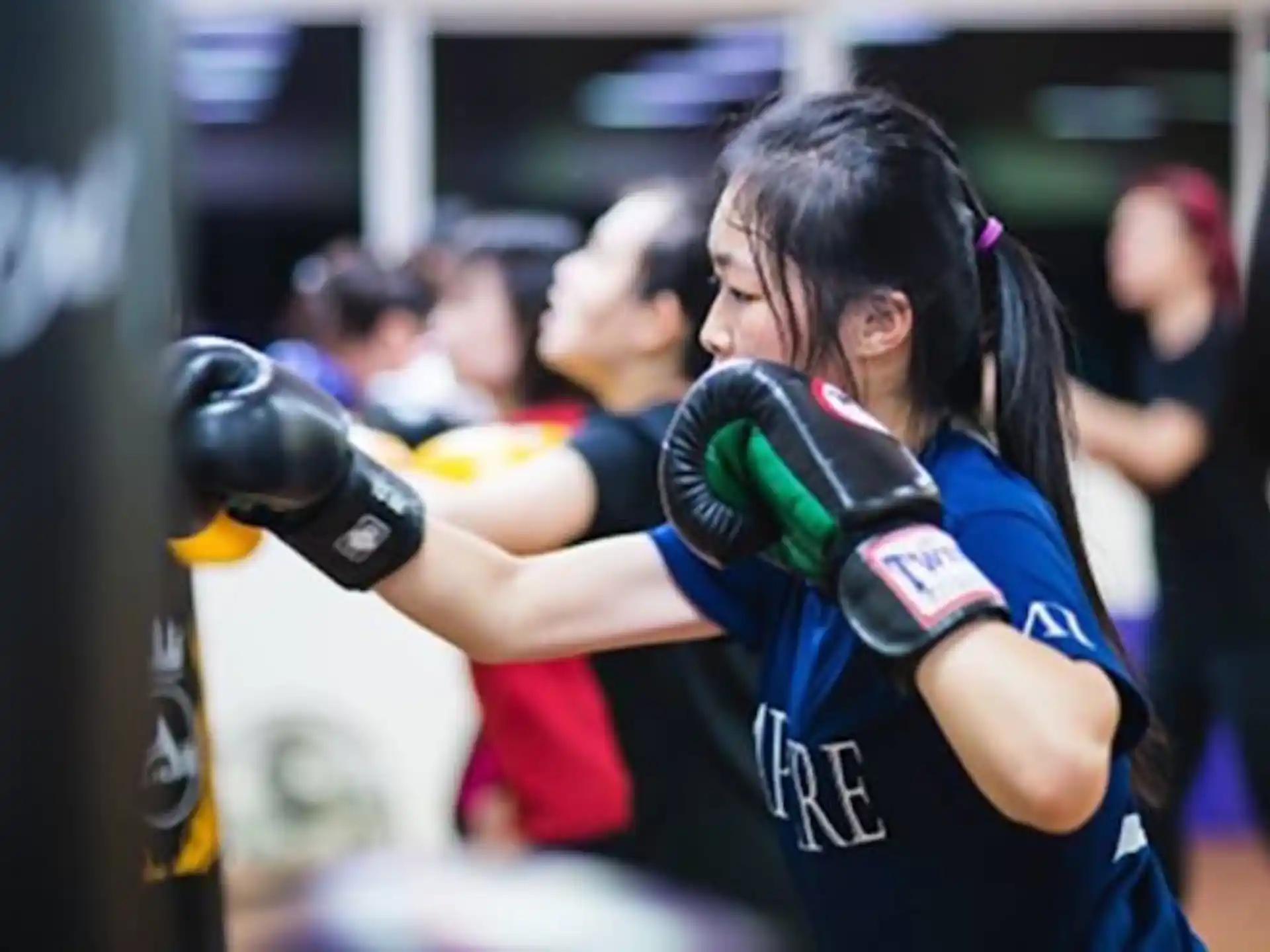 a person wearing boxing gloves