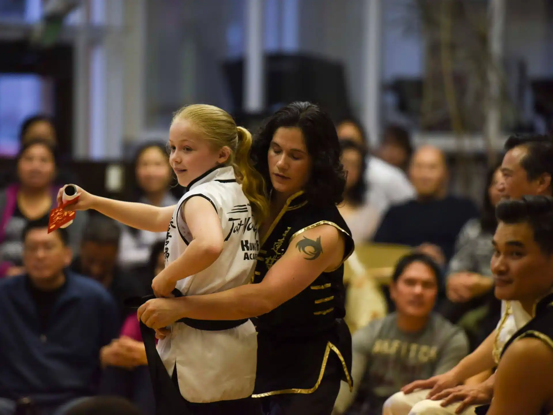 a couple of women in basketball uniforms