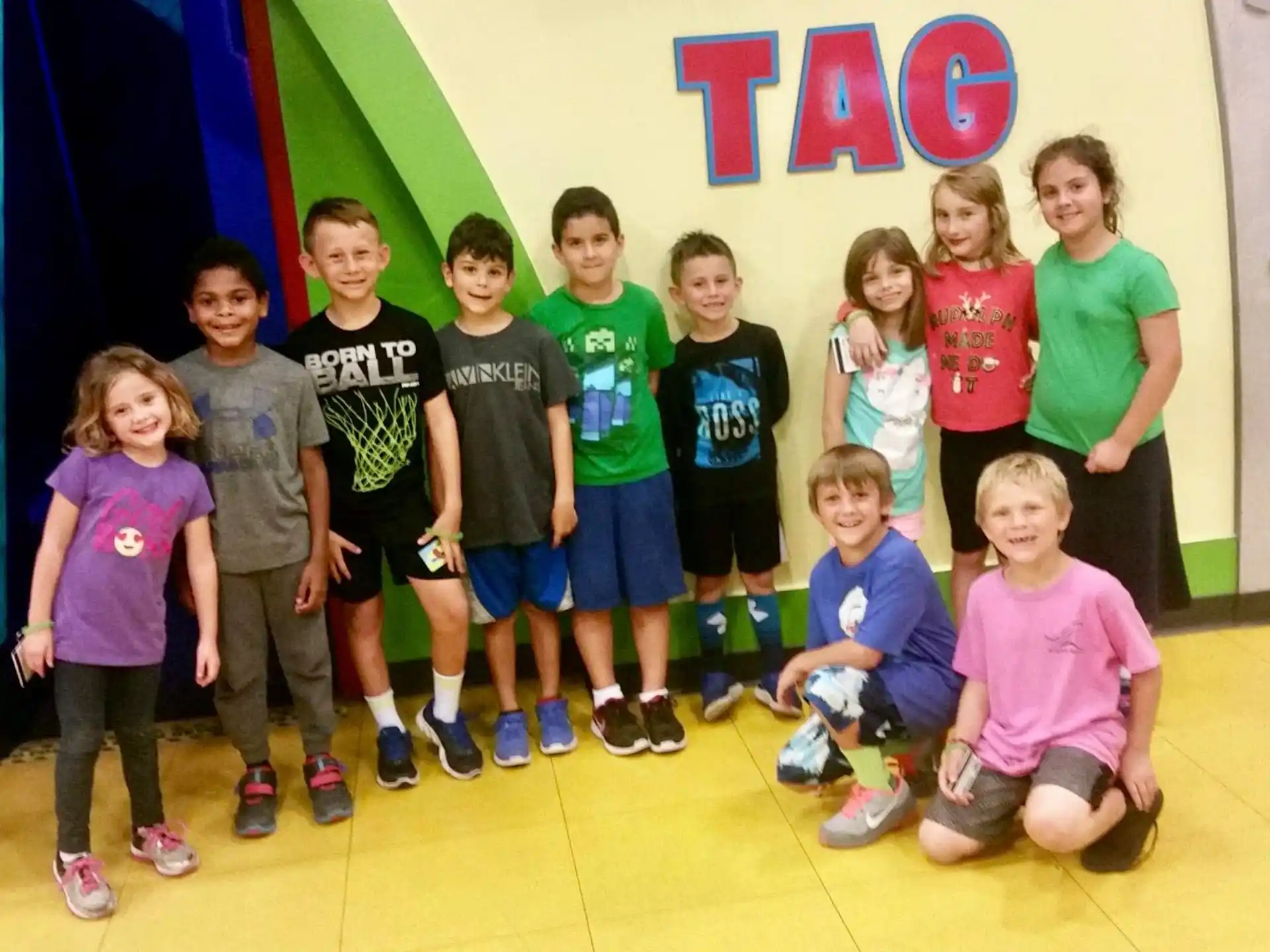 a group of children posing for a photo