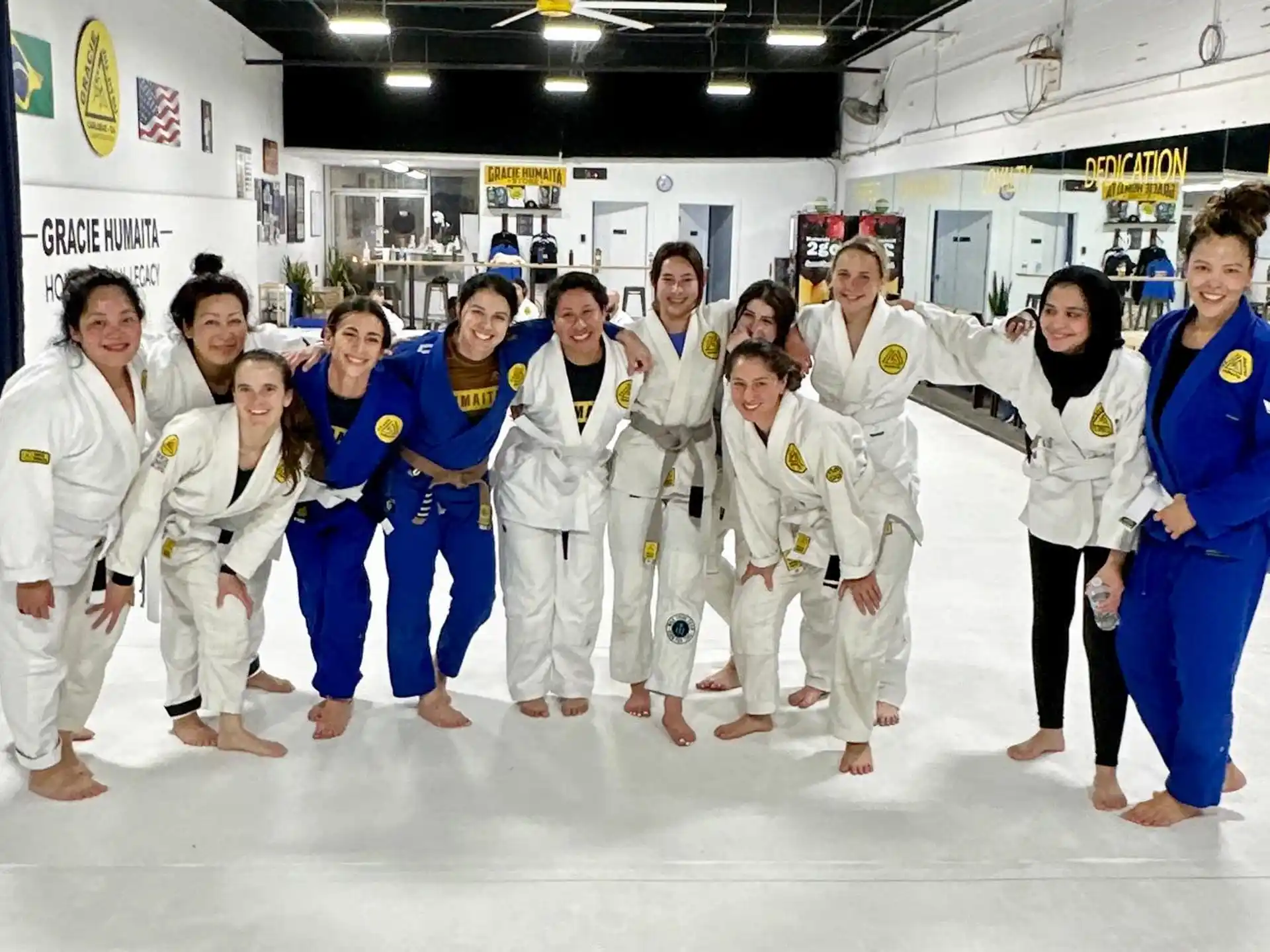 a group of people in karate uniforms