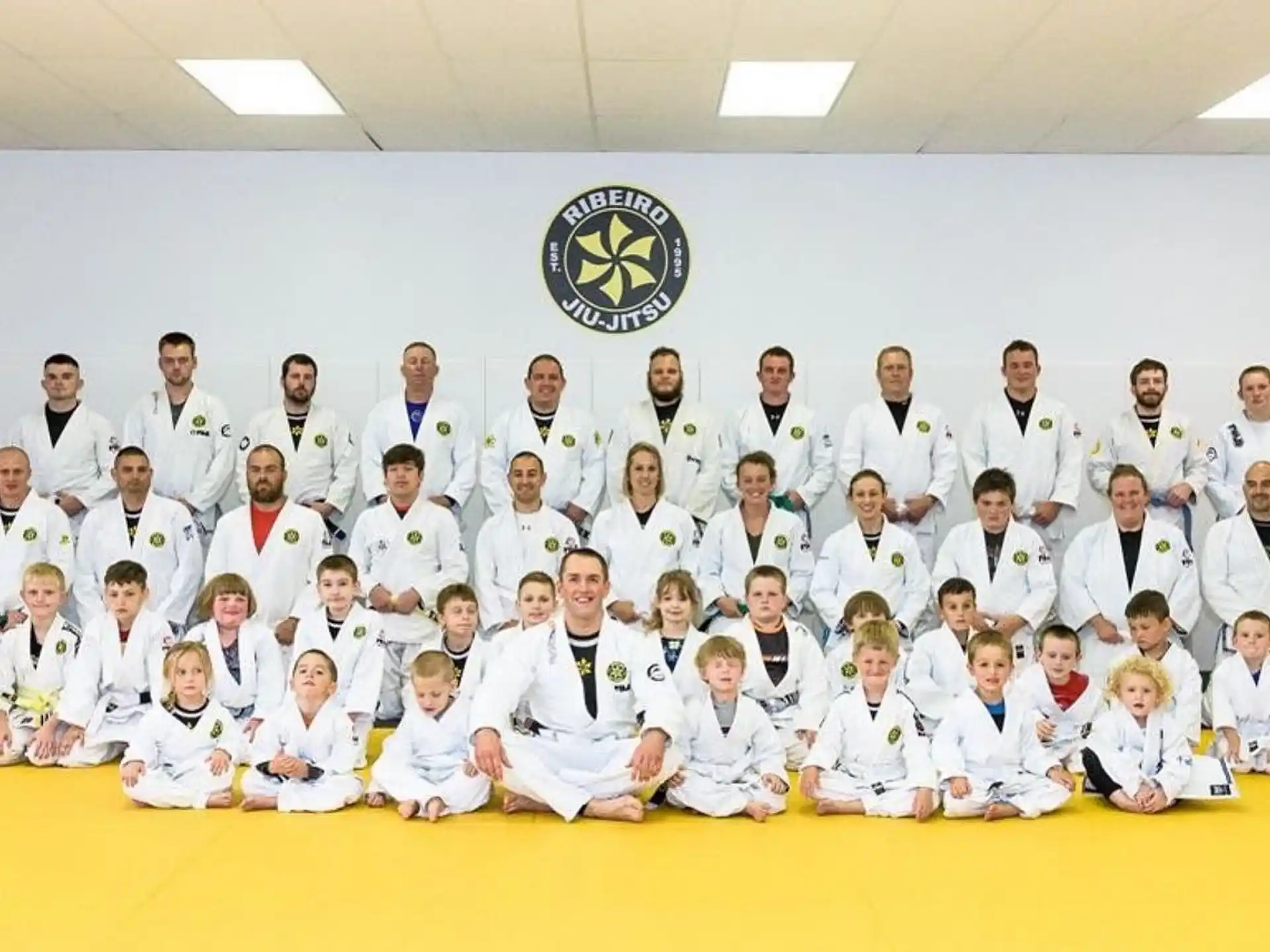 a group of people in white robes