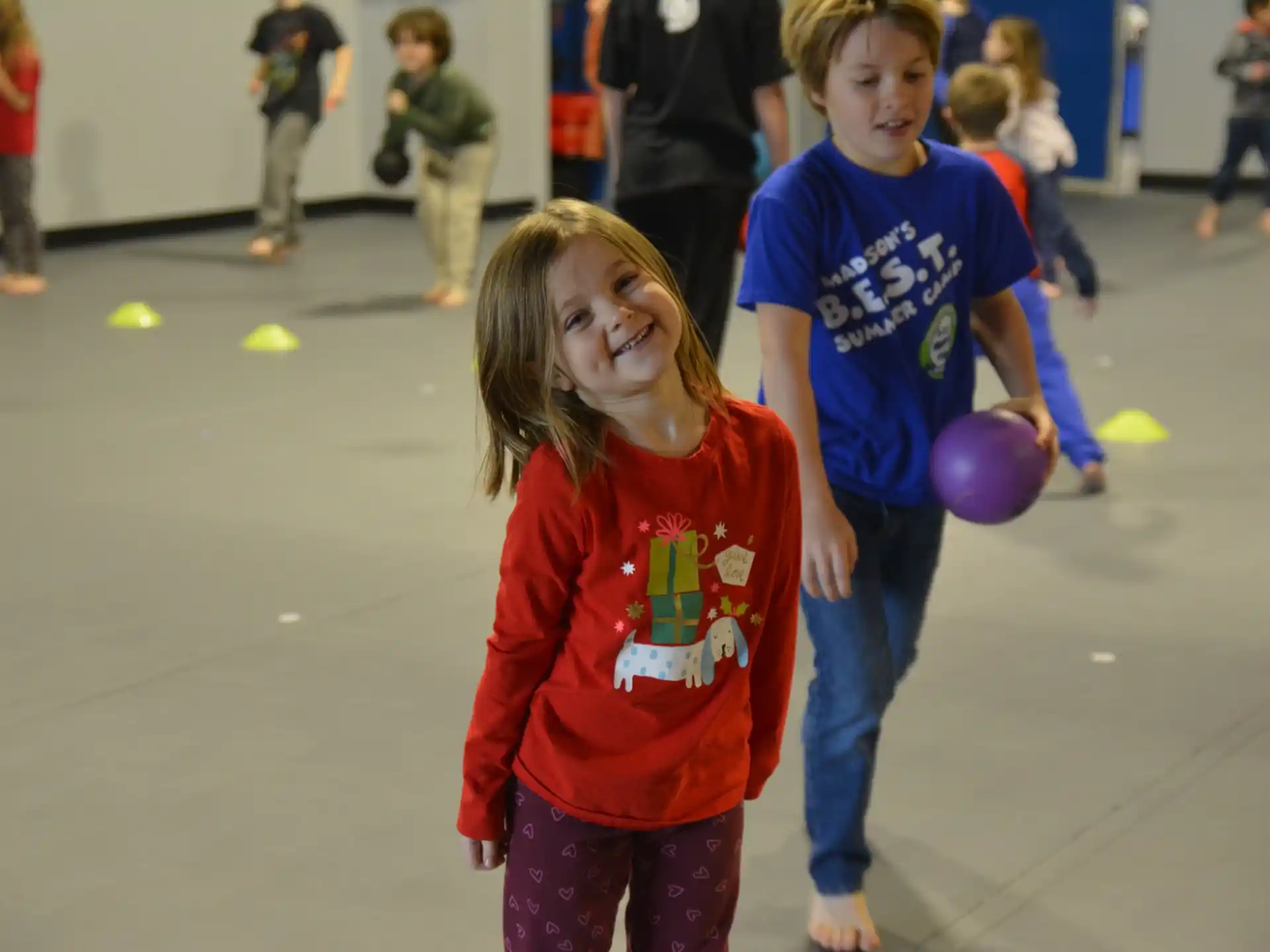 a group of children playing with a ball