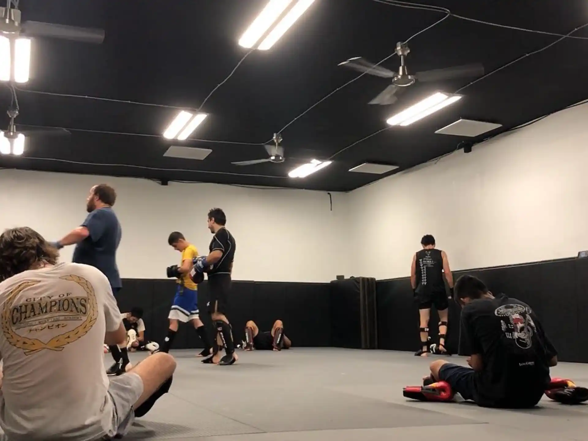 a group of people in a gym