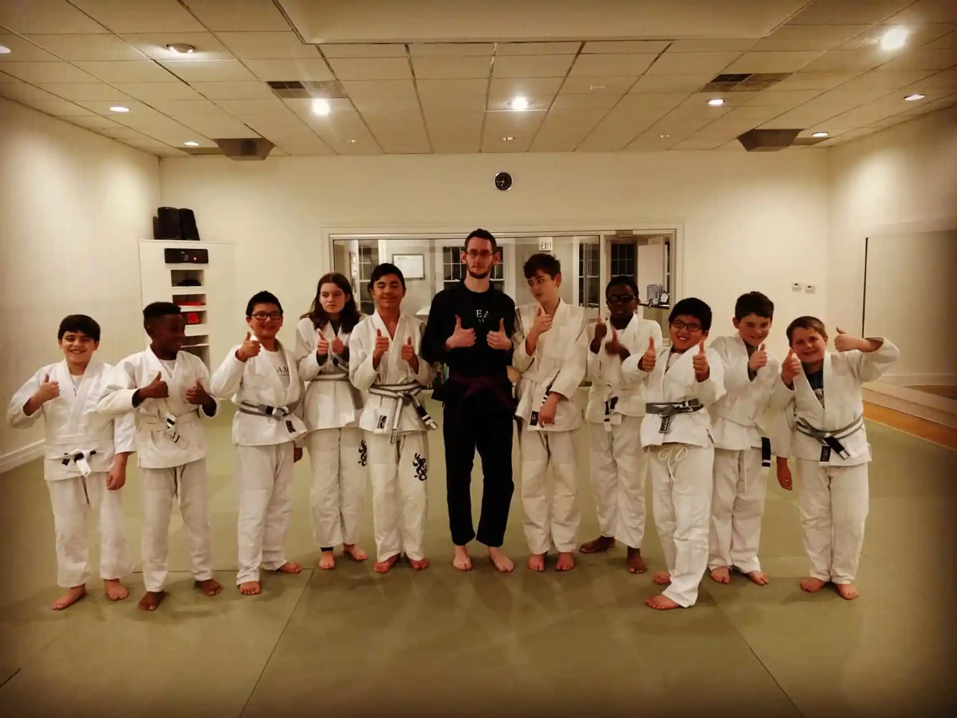 a group of people wearing karate uniforms