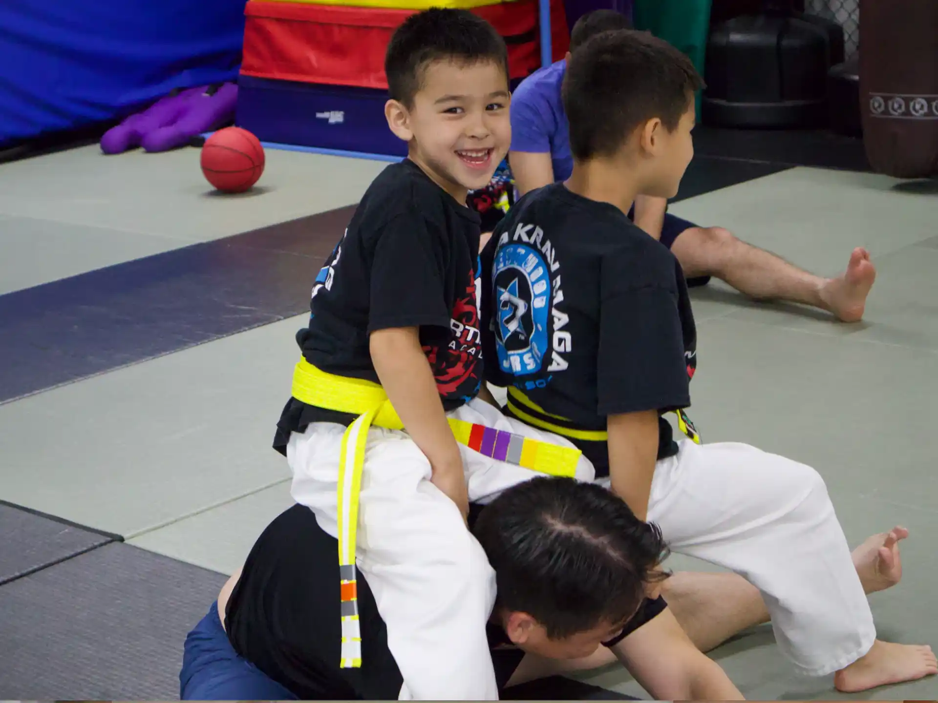 a group of boys in a gym