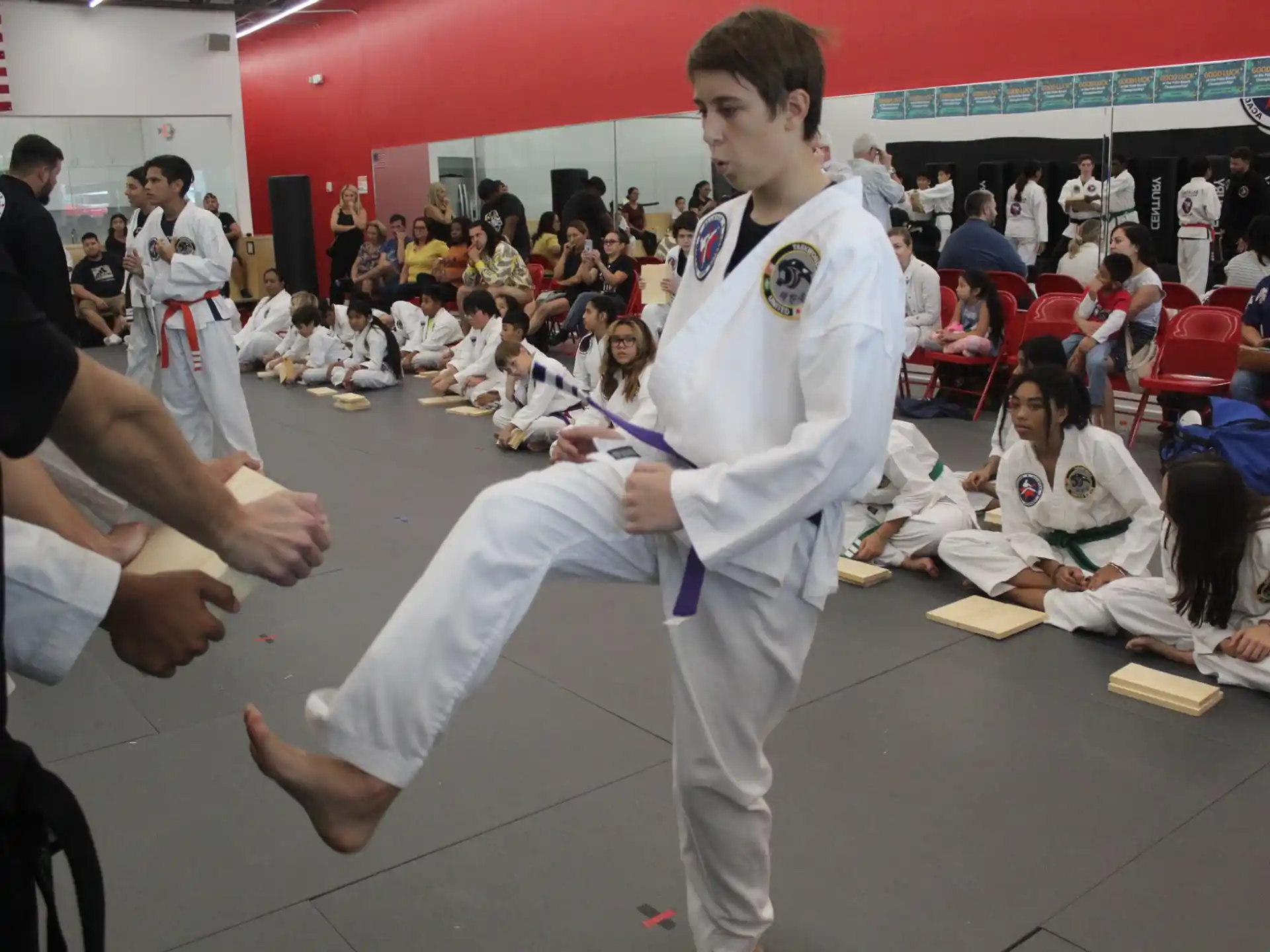 a man in a karate uniform