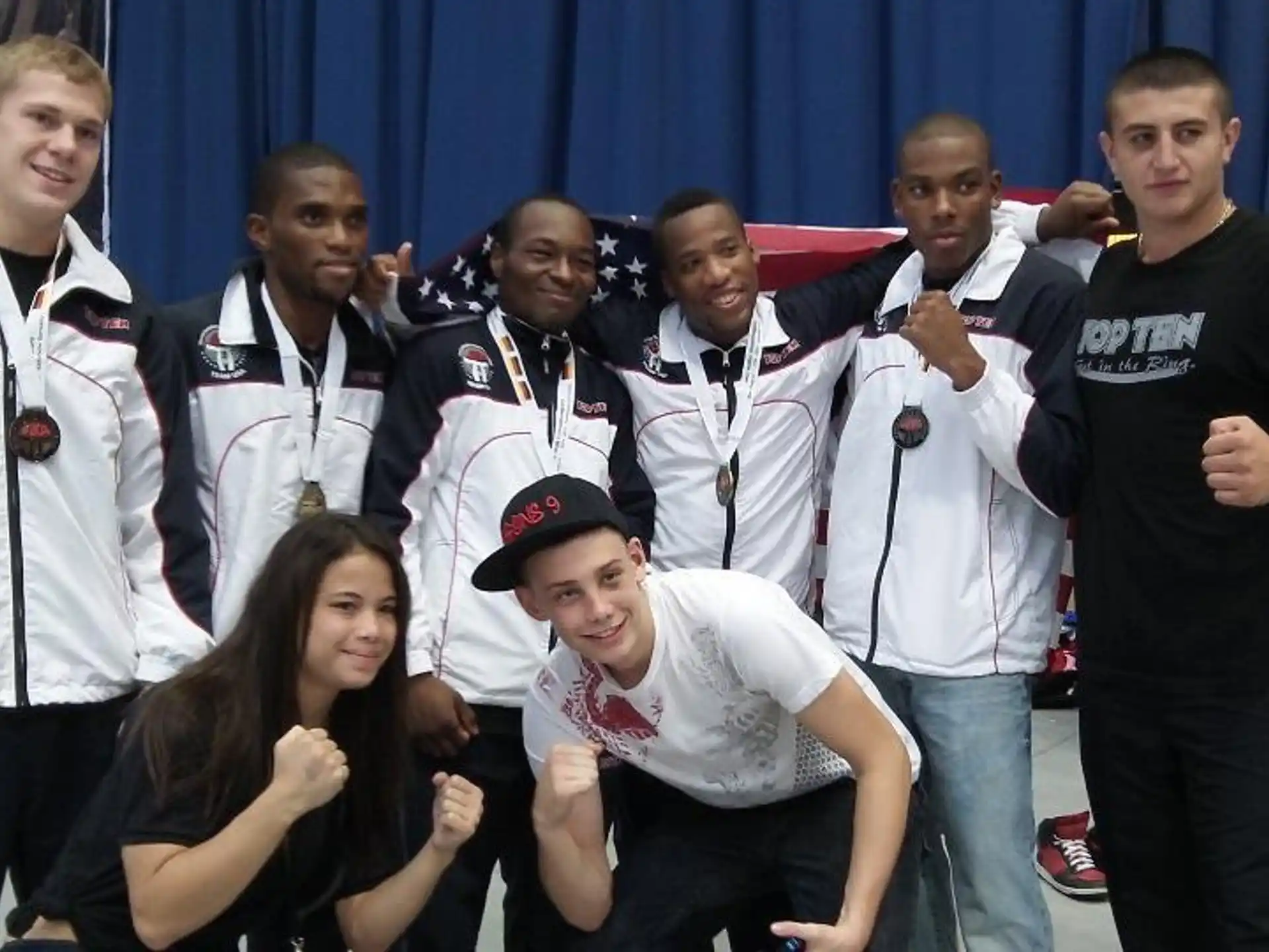 a group of people posing for a photo