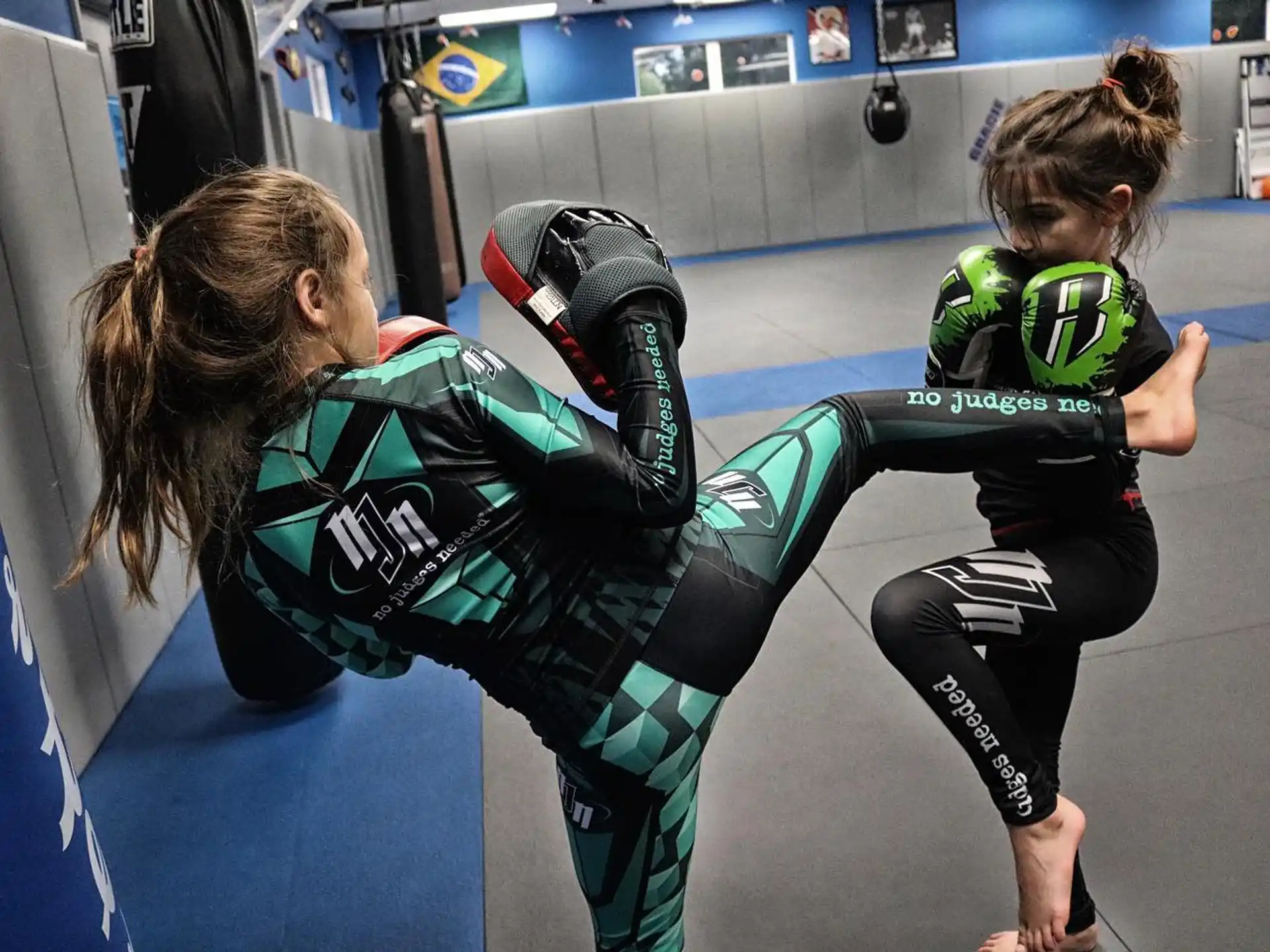 a couple of women in a wrestling ring