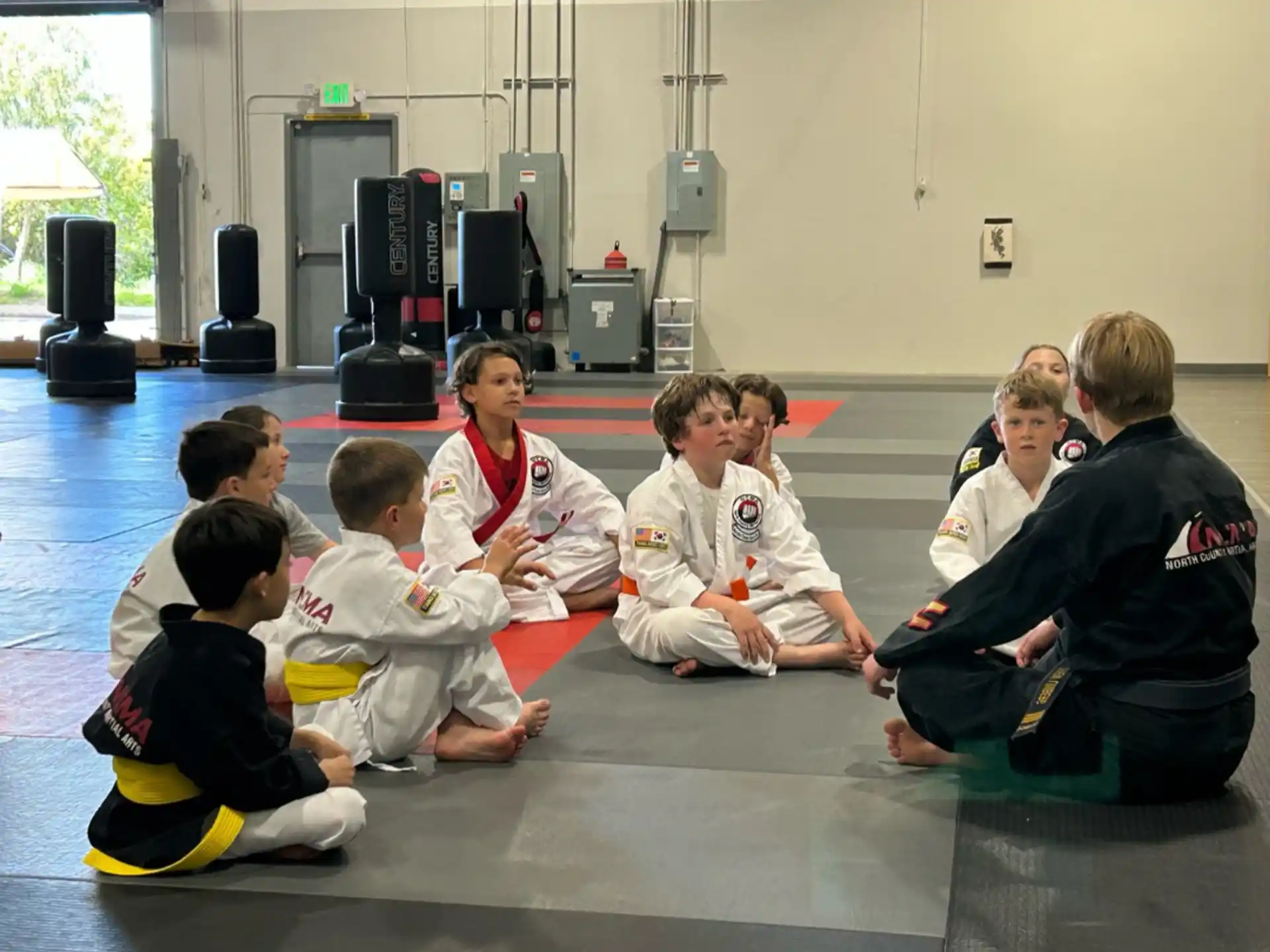 a group of children sitting on the floor