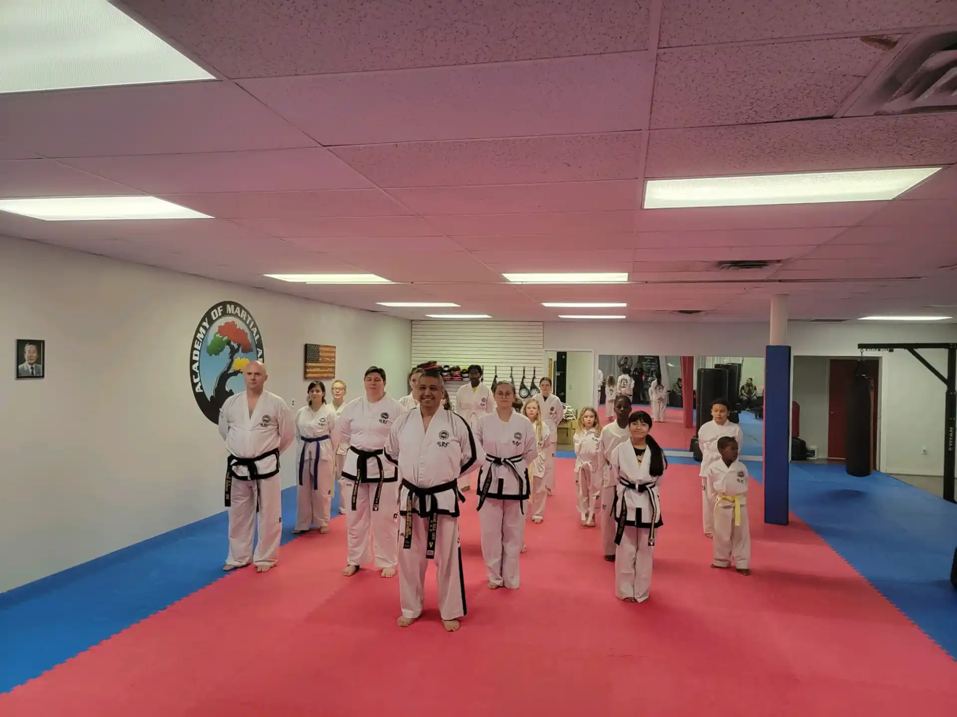 a group of people in karate uniforms