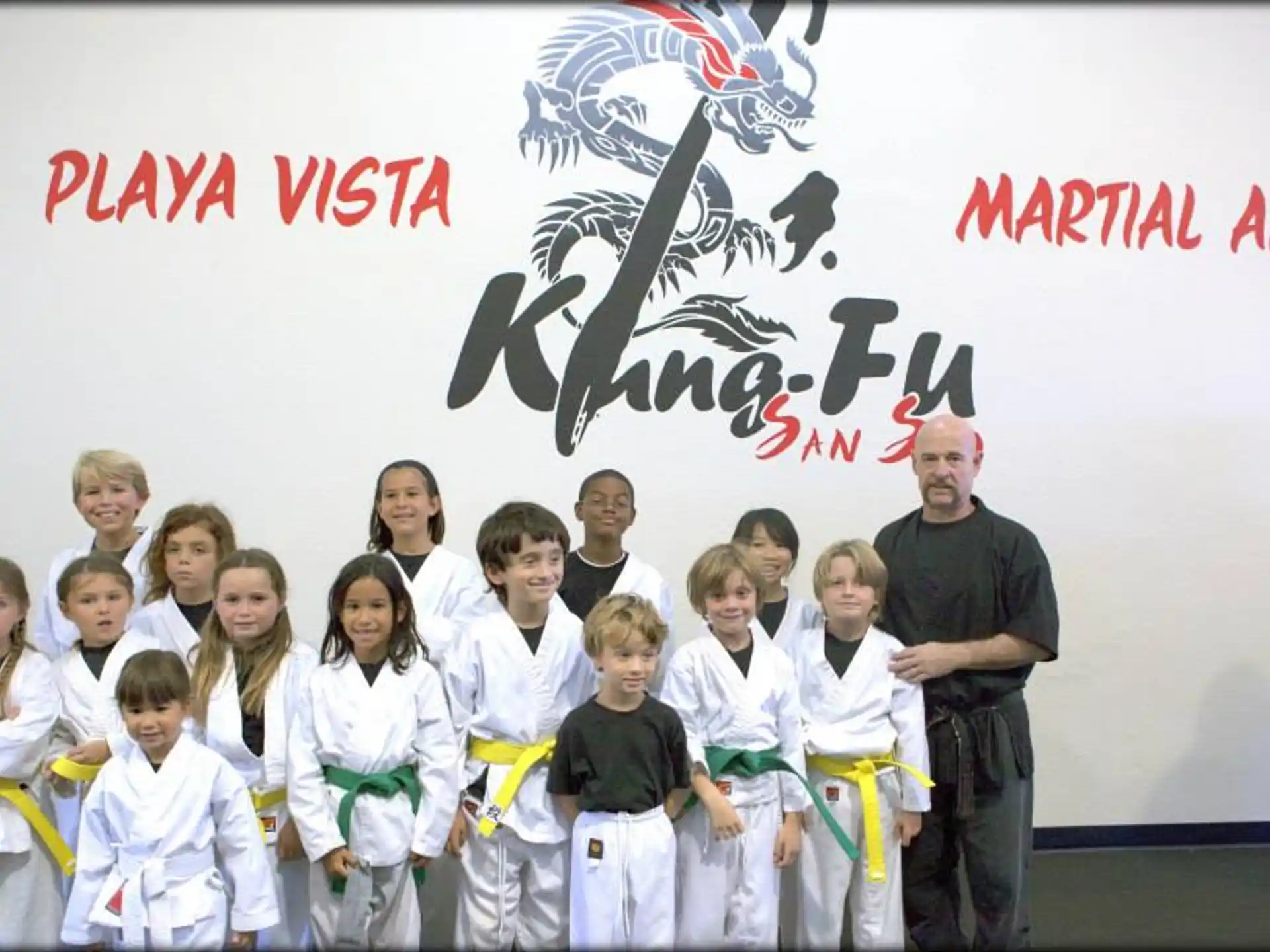 a group of children posing for a photo