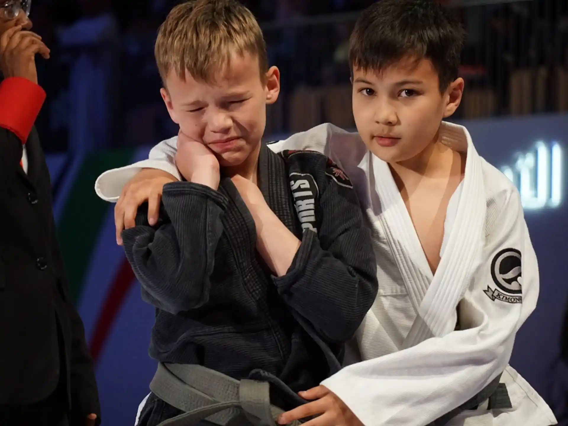 a couple of boys posing for the camera