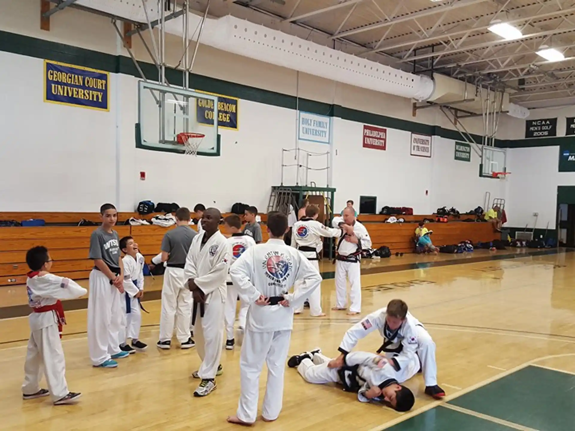 a group of people in karate uniforms