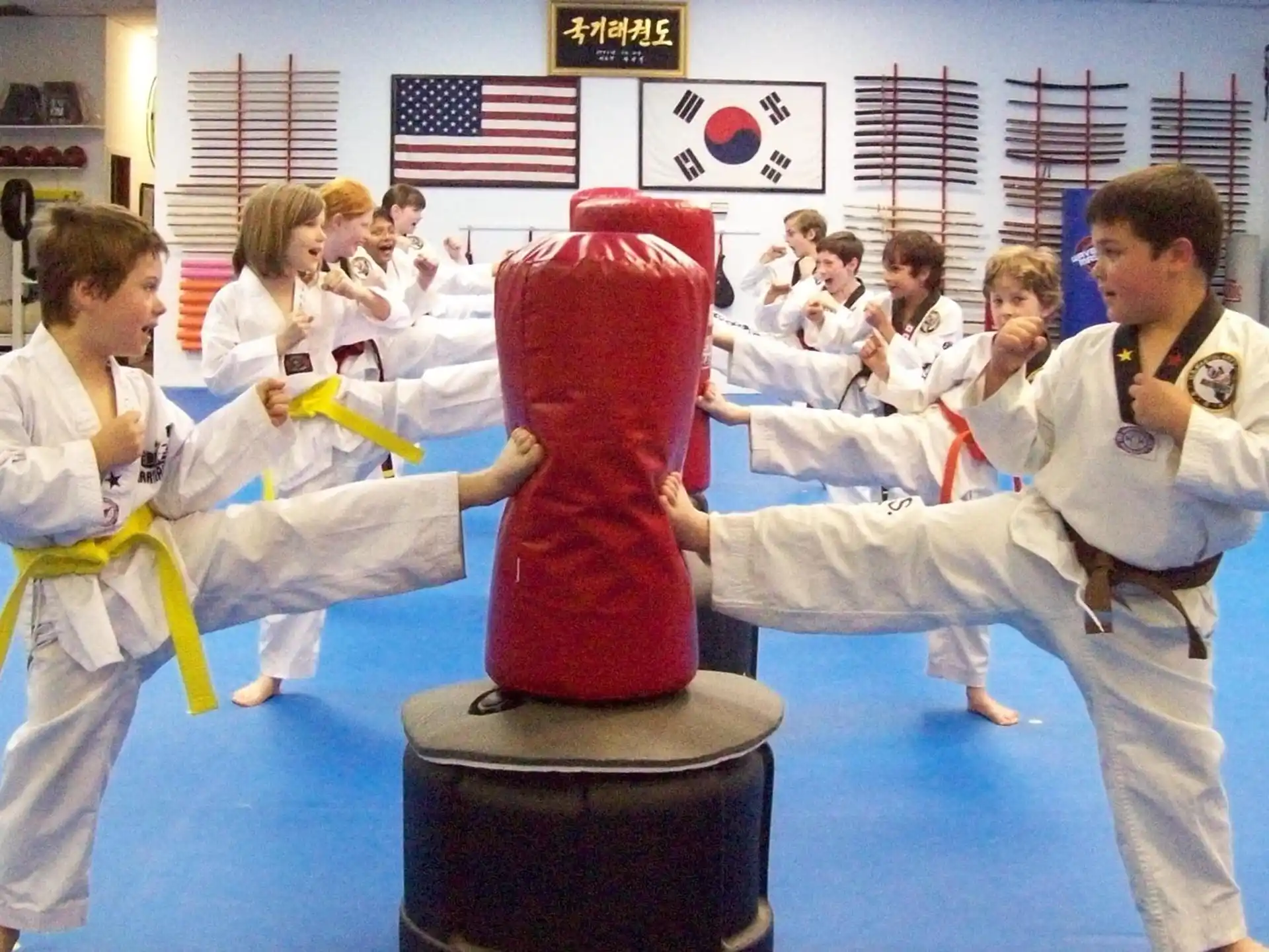 a group of people in karate uniforms