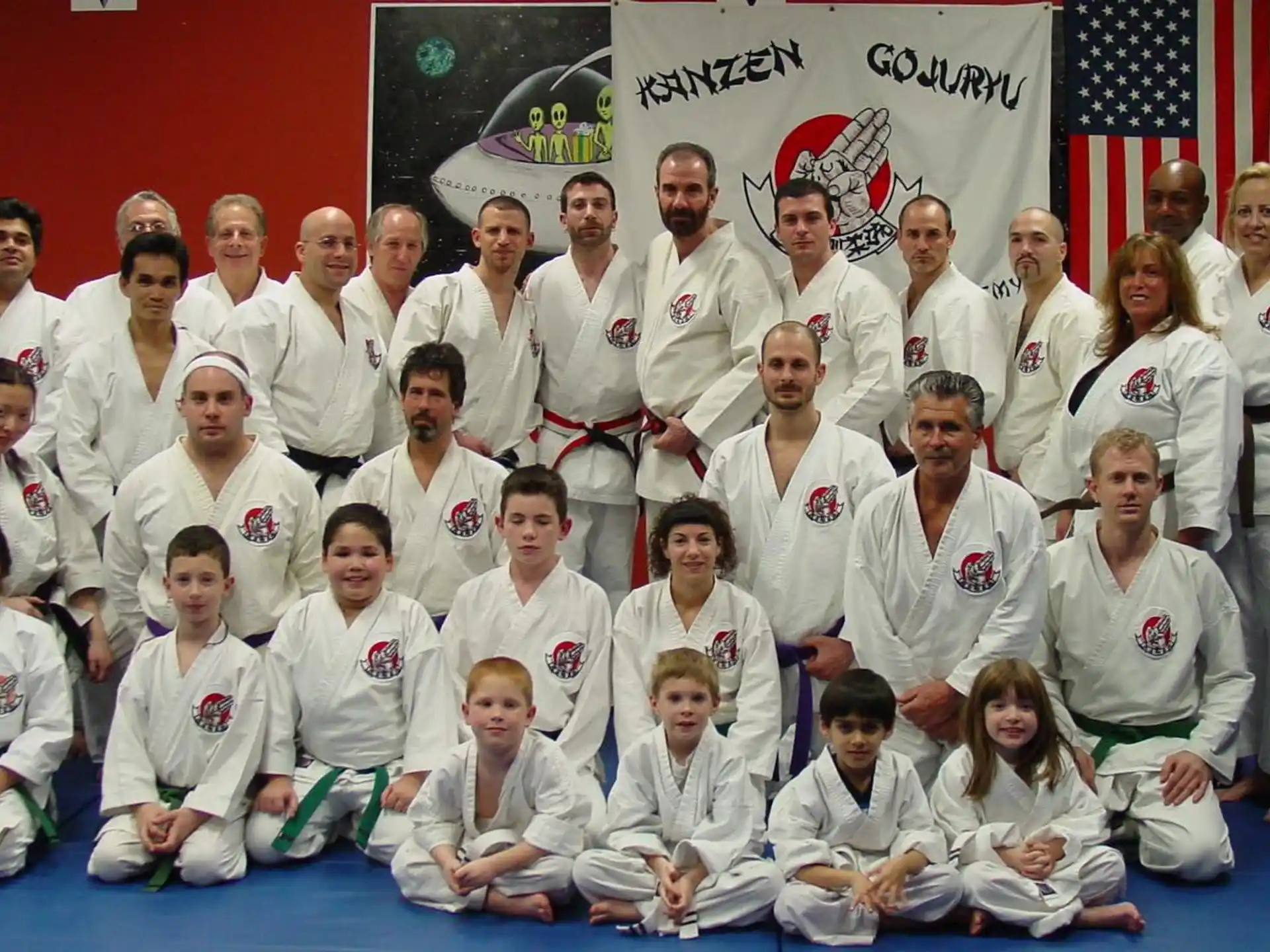 a group of people in white shirts
