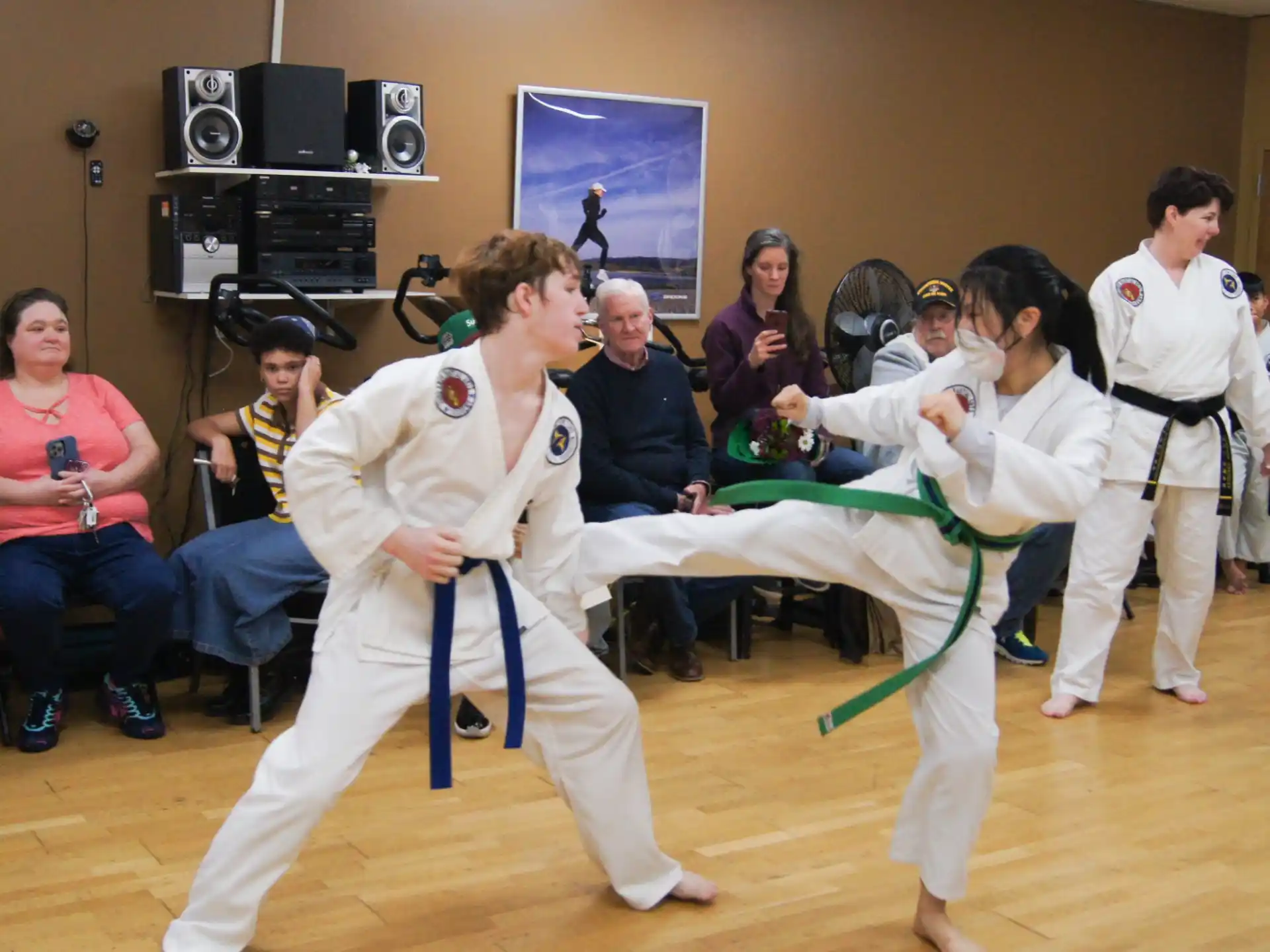 a group of people in karate uniforms