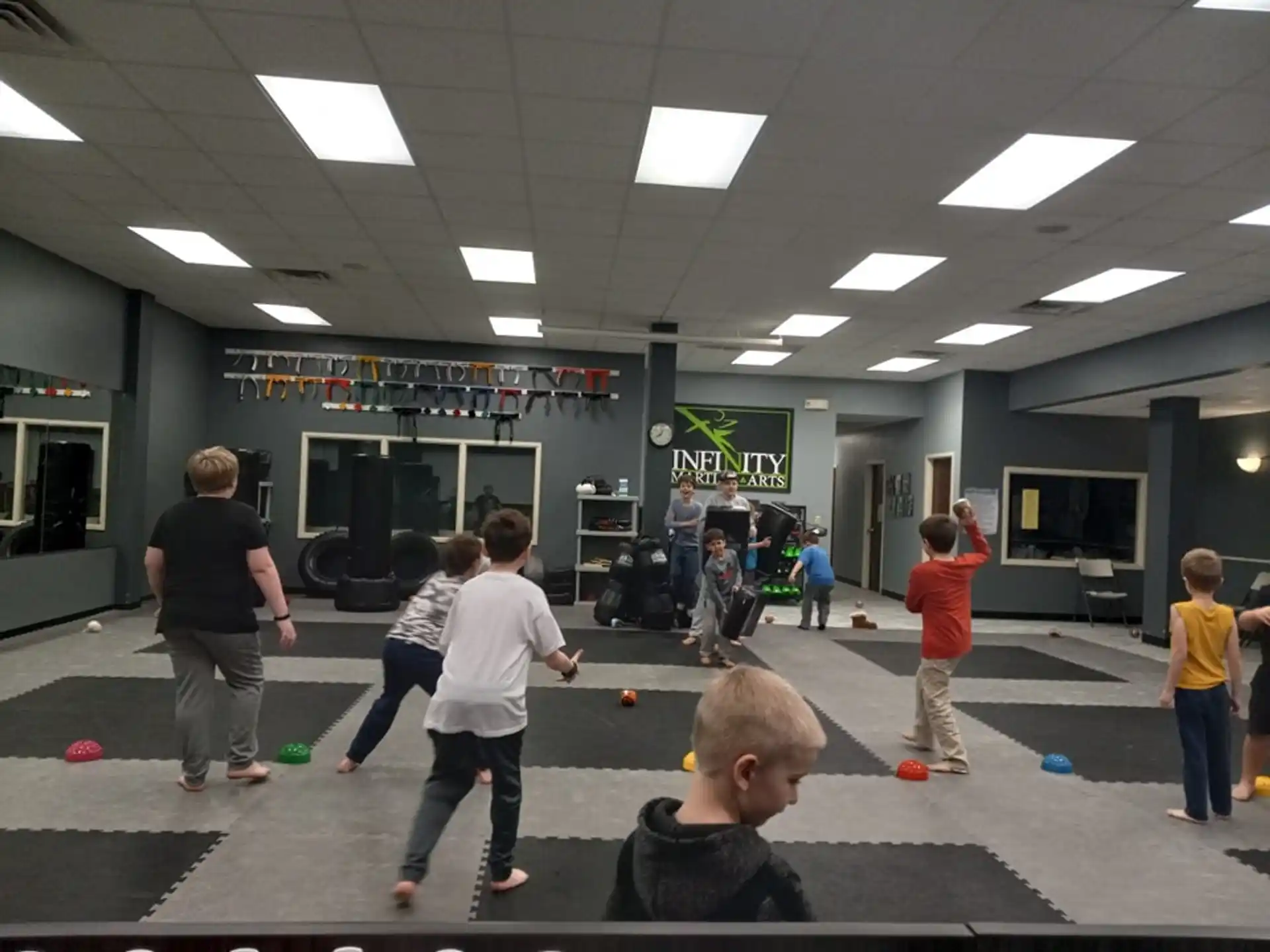 a group of people playing with balls