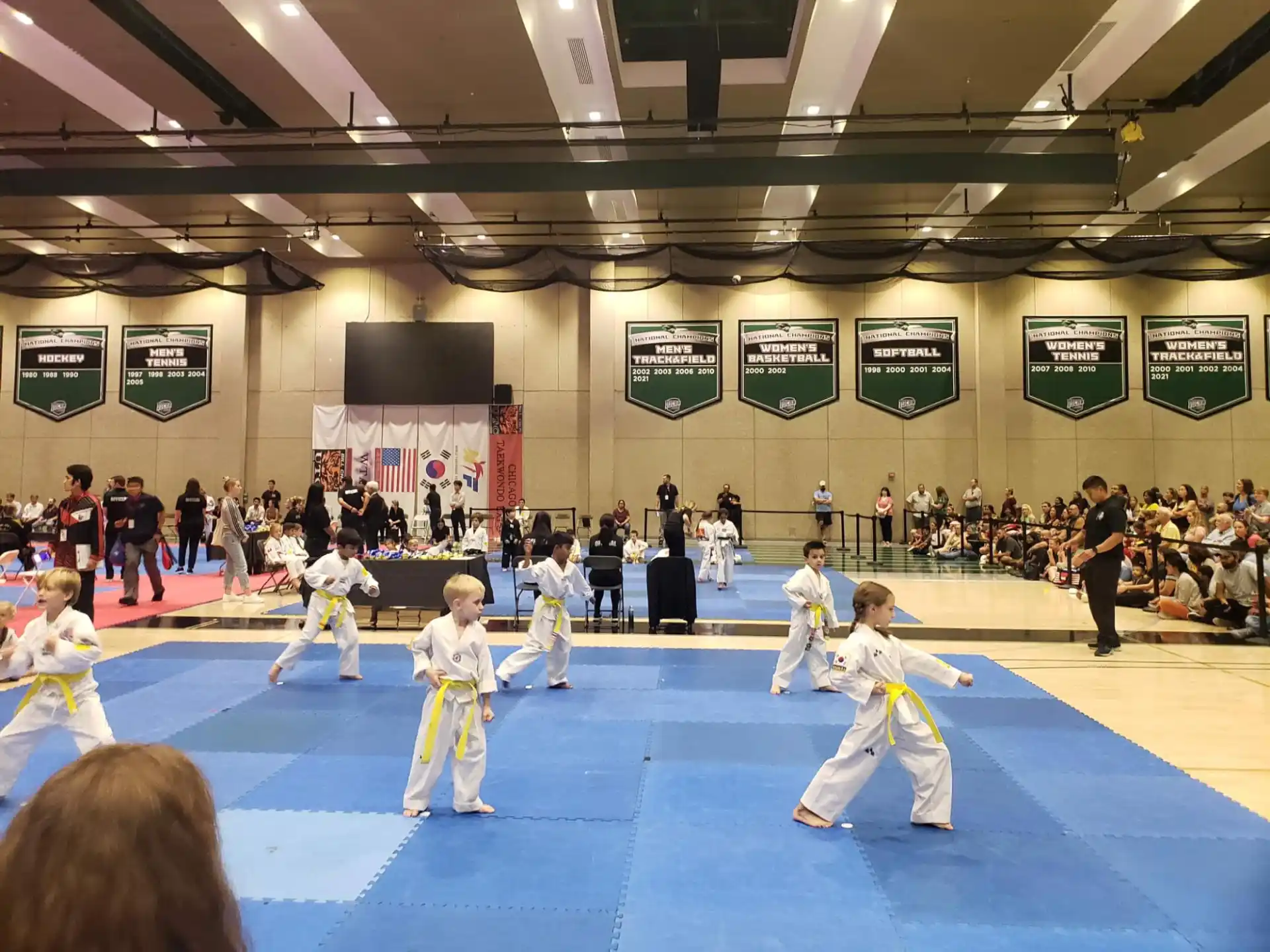 a group of people in karate uniforms